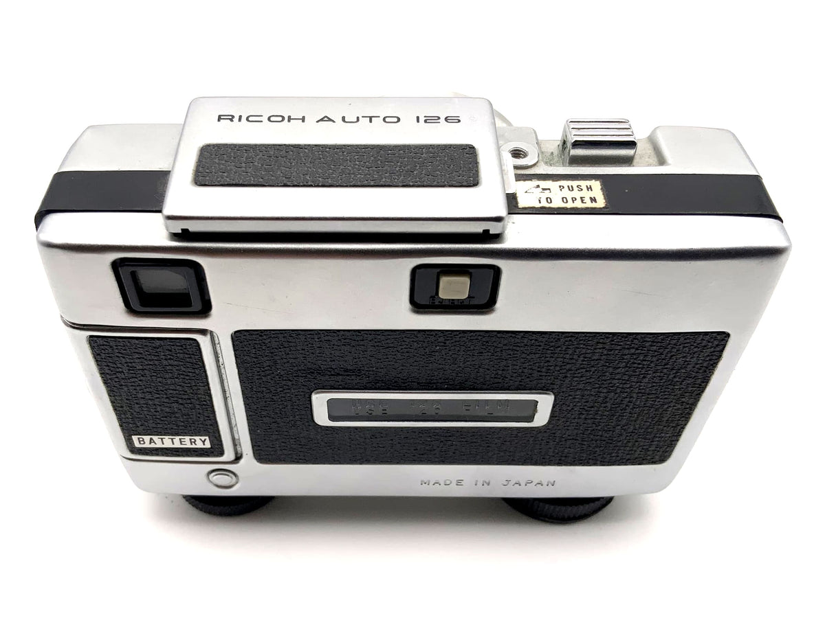 Ricoh Auto 126 viewfinder camera with Rikenon 35mm 1:2.8 lens, 126 film compact camera