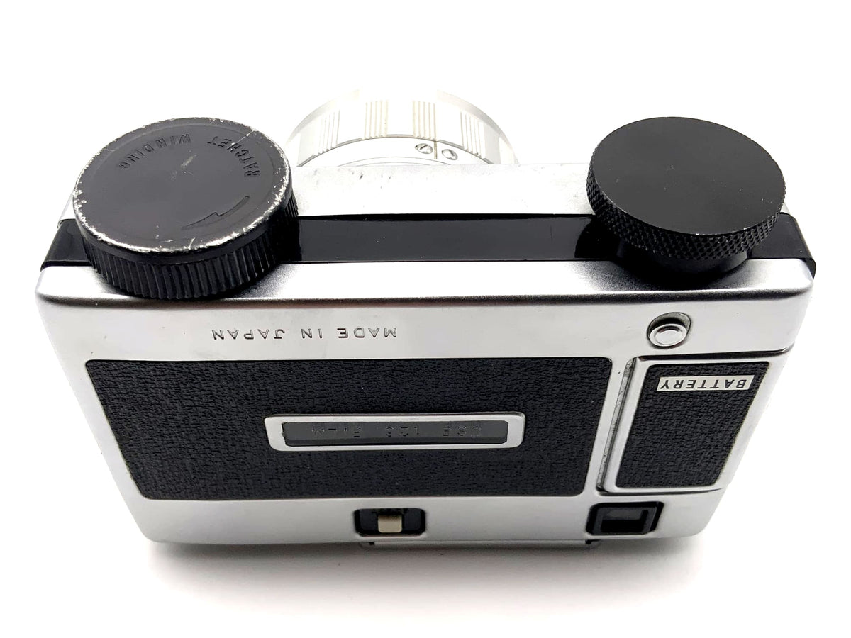 Ricoh Auto 126 viewfinder camera with Rikenon 35mm 1:2.8 lens, 126 film compact camera