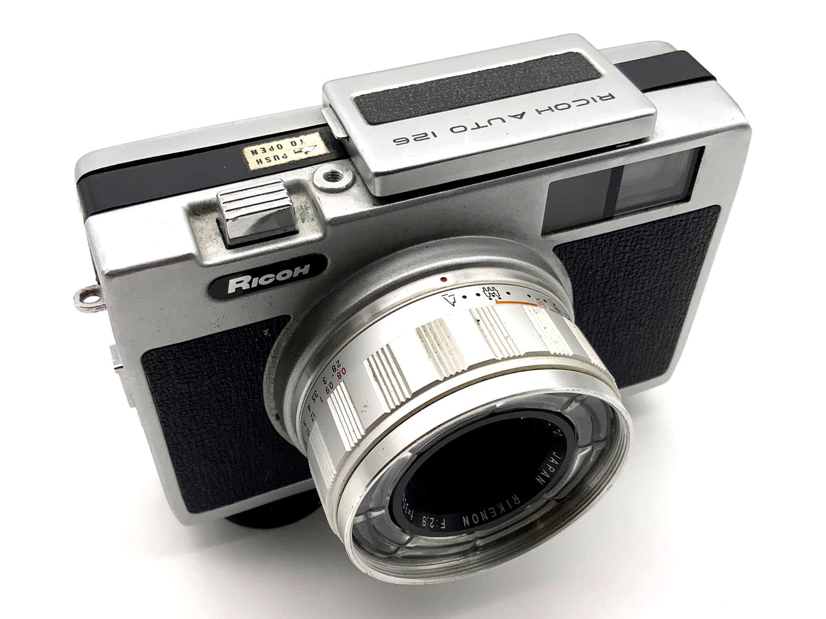 Ricoh Auto 126 viewfinder camera with Rikenon 35mm 1:2.8 lens, 126 film compact camera