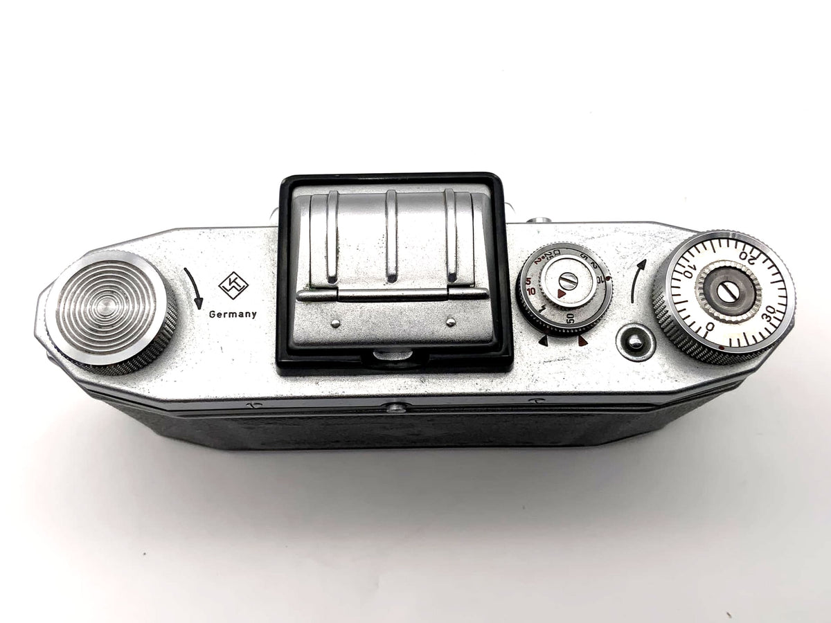 Praktica FX 2 SLR camera with waist-level finder and Pentacon 35mm lens, body