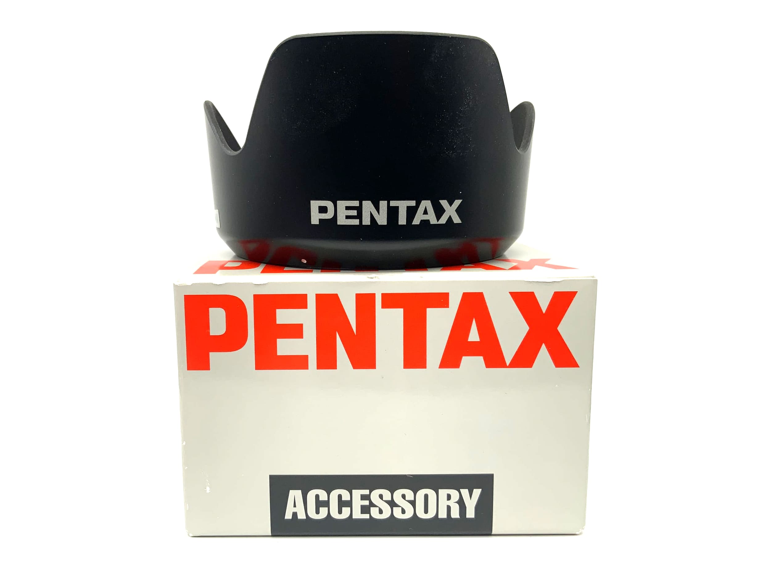 Pentax PH-RBJ 67mm lens hood with original packaging.