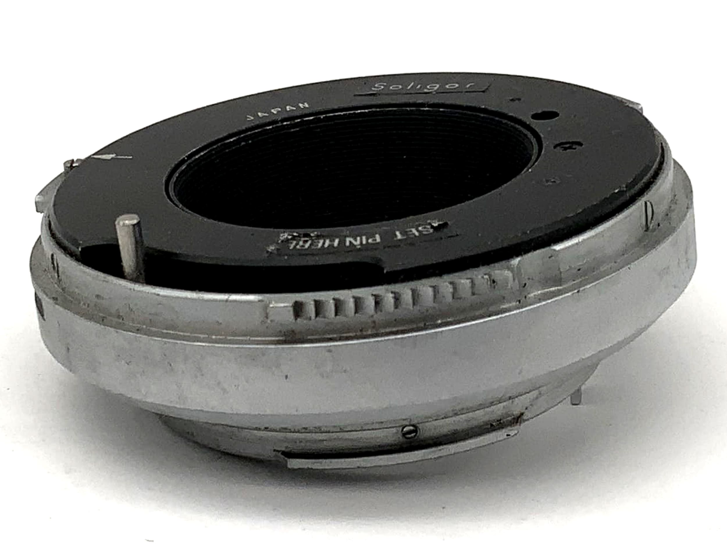 Adaptateur d'objectif argenté (Soligor T4/Vivitar TX -> Minolta MD)