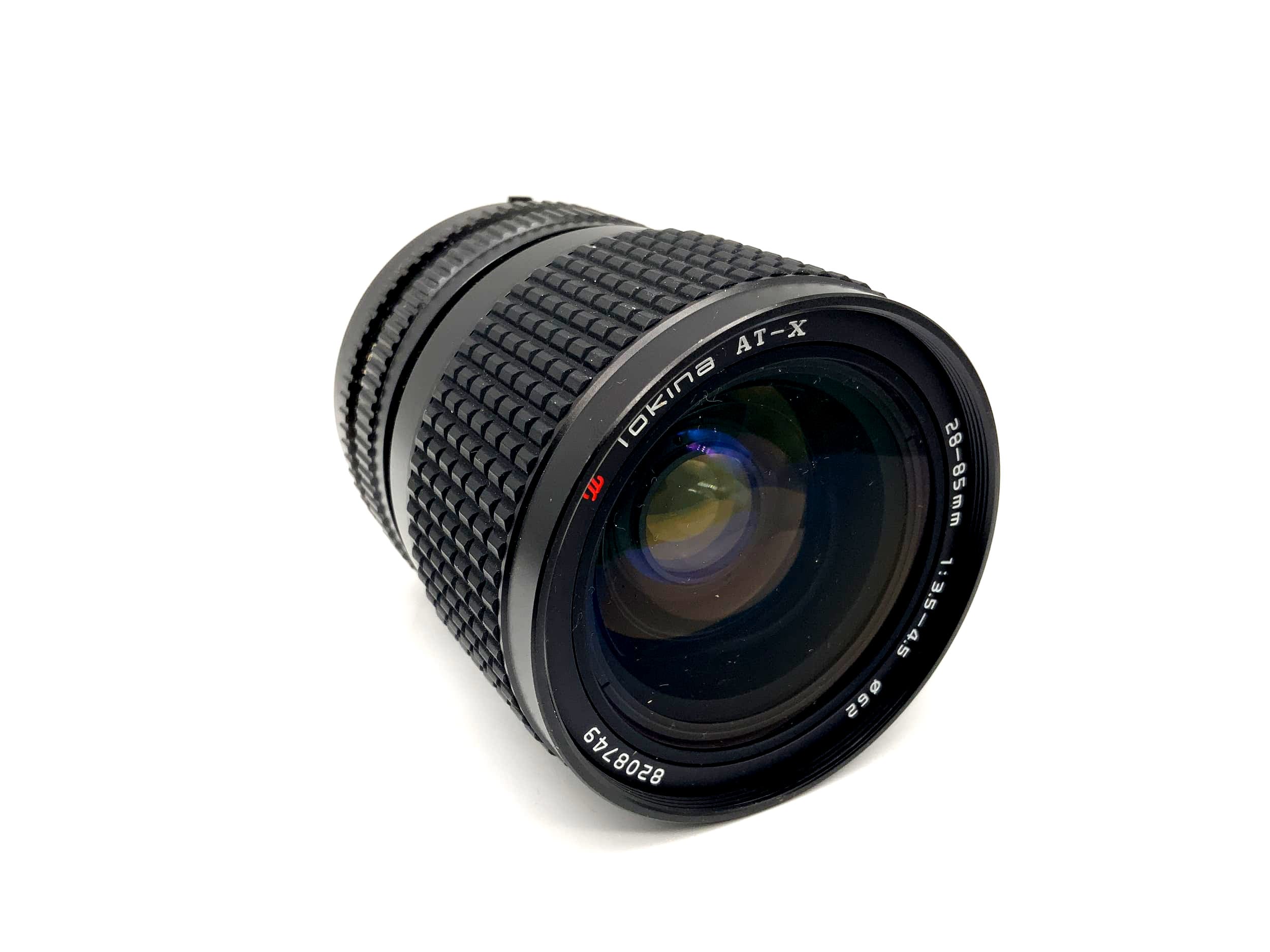 Tokina 28-85mm 1:3.5-4.5 lens AT-X close focus camera Camera Lens (Nikon F)