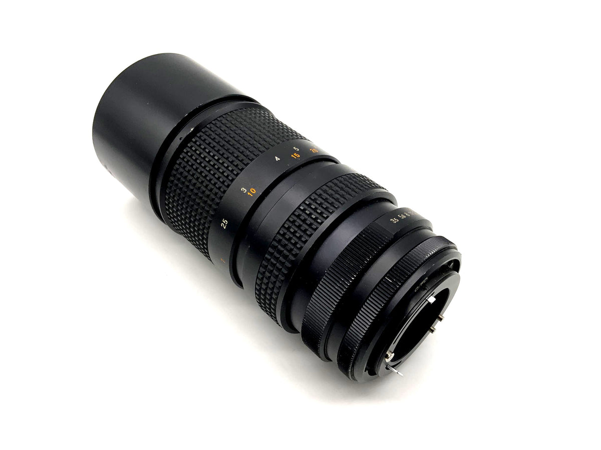 Objectif Tokina 70-210 mm 1:3.5 RMC pour appareil photo (Canon FD)