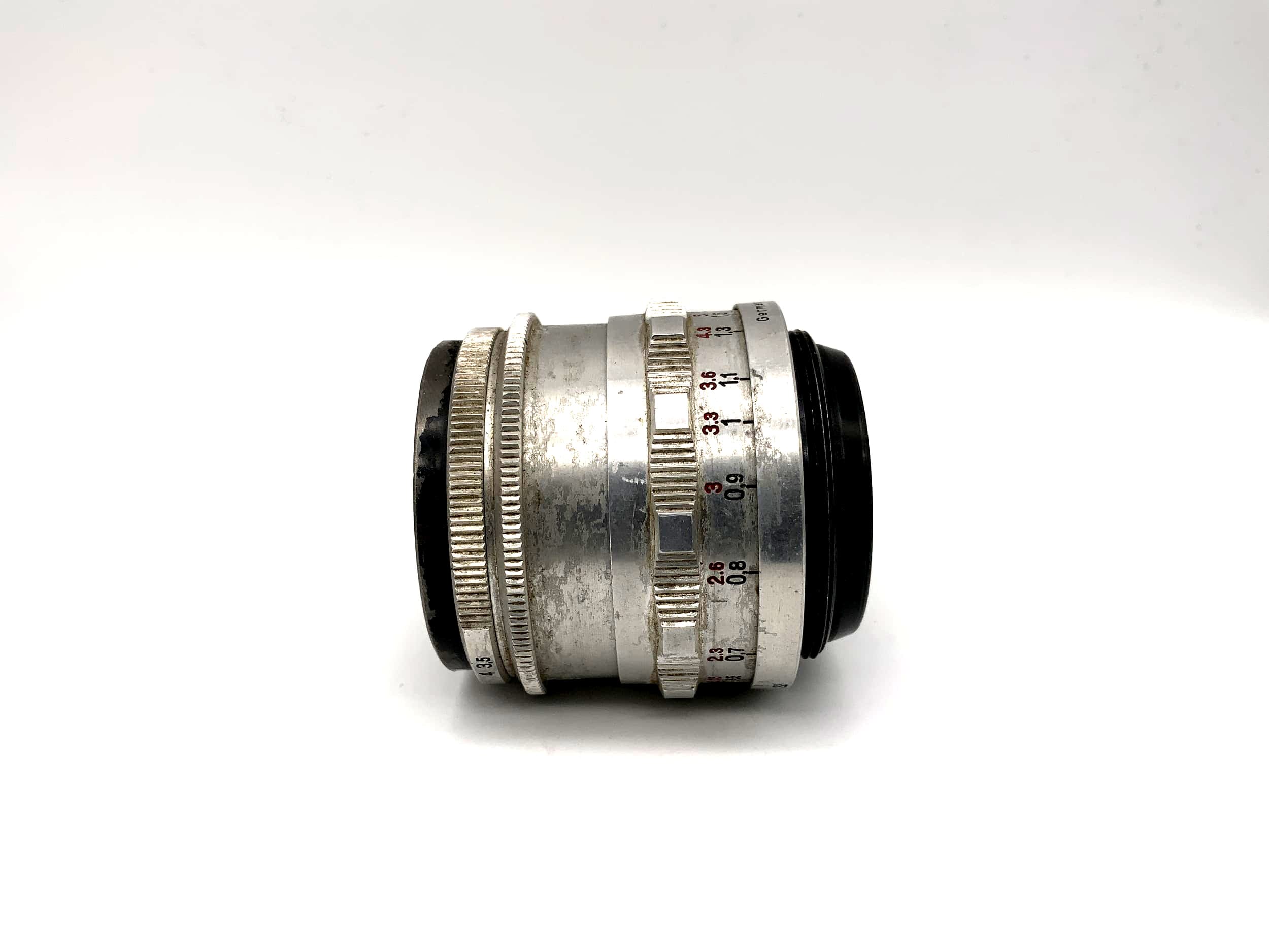 Objectif Carl Zeiss 50 mm 1:3.5 Tessar Q1 compact rouge T 14 lames (M42)