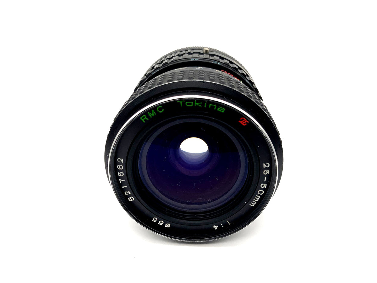 Objectif Tokina 25-50mm 1:4 RMC pour appareil photo (Canon FD) Brouillard !