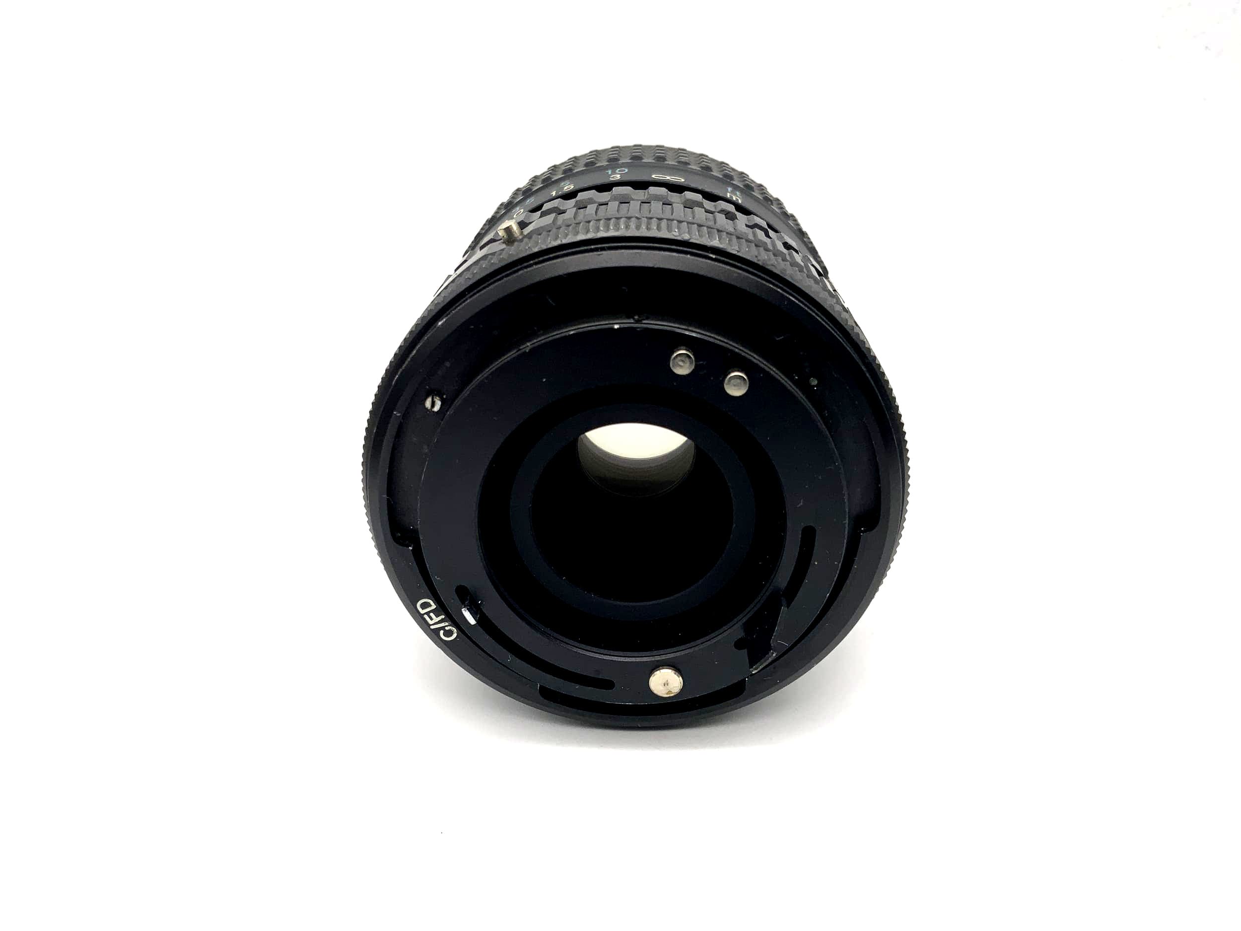 Objectif Tokina 25-50mm 1:4 RMC pour appareil photo (Canon FD) Brouillard !
