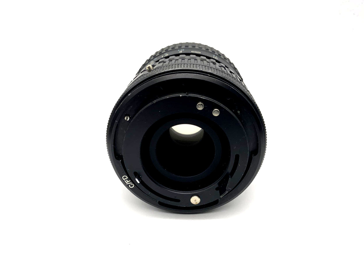 Objectif Tokina 25-50mm 1:4 RMC pour appareil photo (Canon FD) Brouillard !