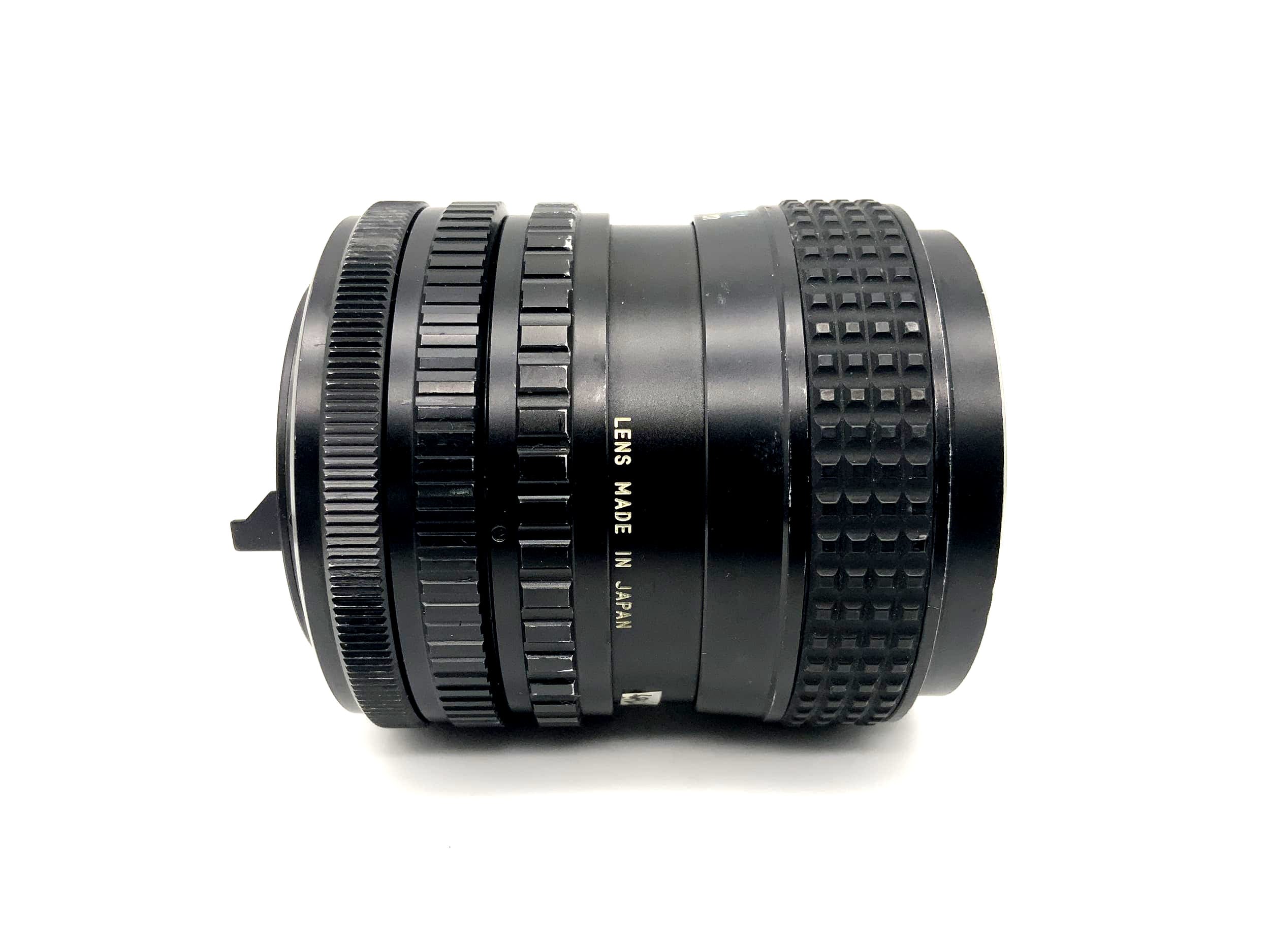 Objectif Tokina 25-50mm 1:4 RMC pour appareil photo (Canon FD) Brouillard !