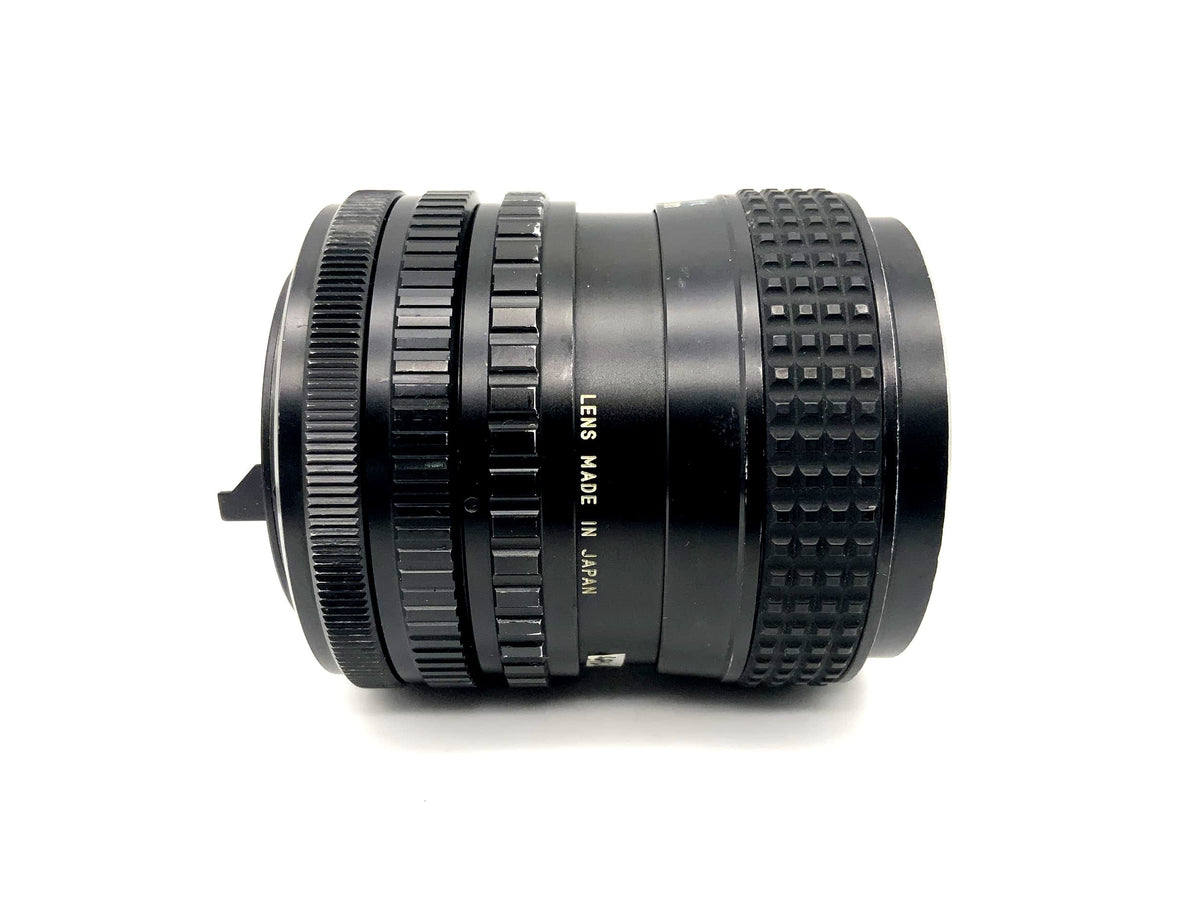 Objectif Tokina 25-50mm 1:4 RMC pour appareil photo (Canon FD) Brouillard !