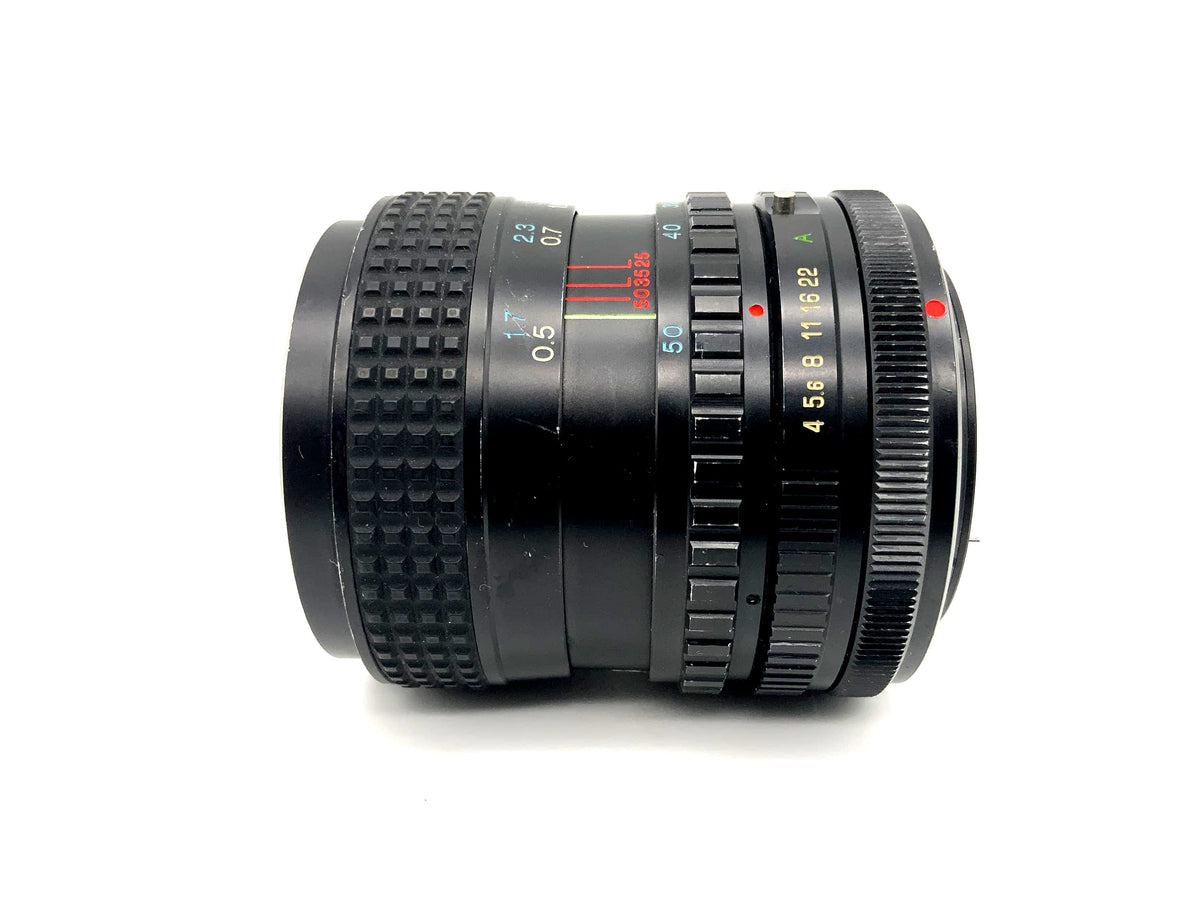 Objectif Tokina 25-50mm 1:4 RMC pour appareil photo (Canon FD) Brouillard !