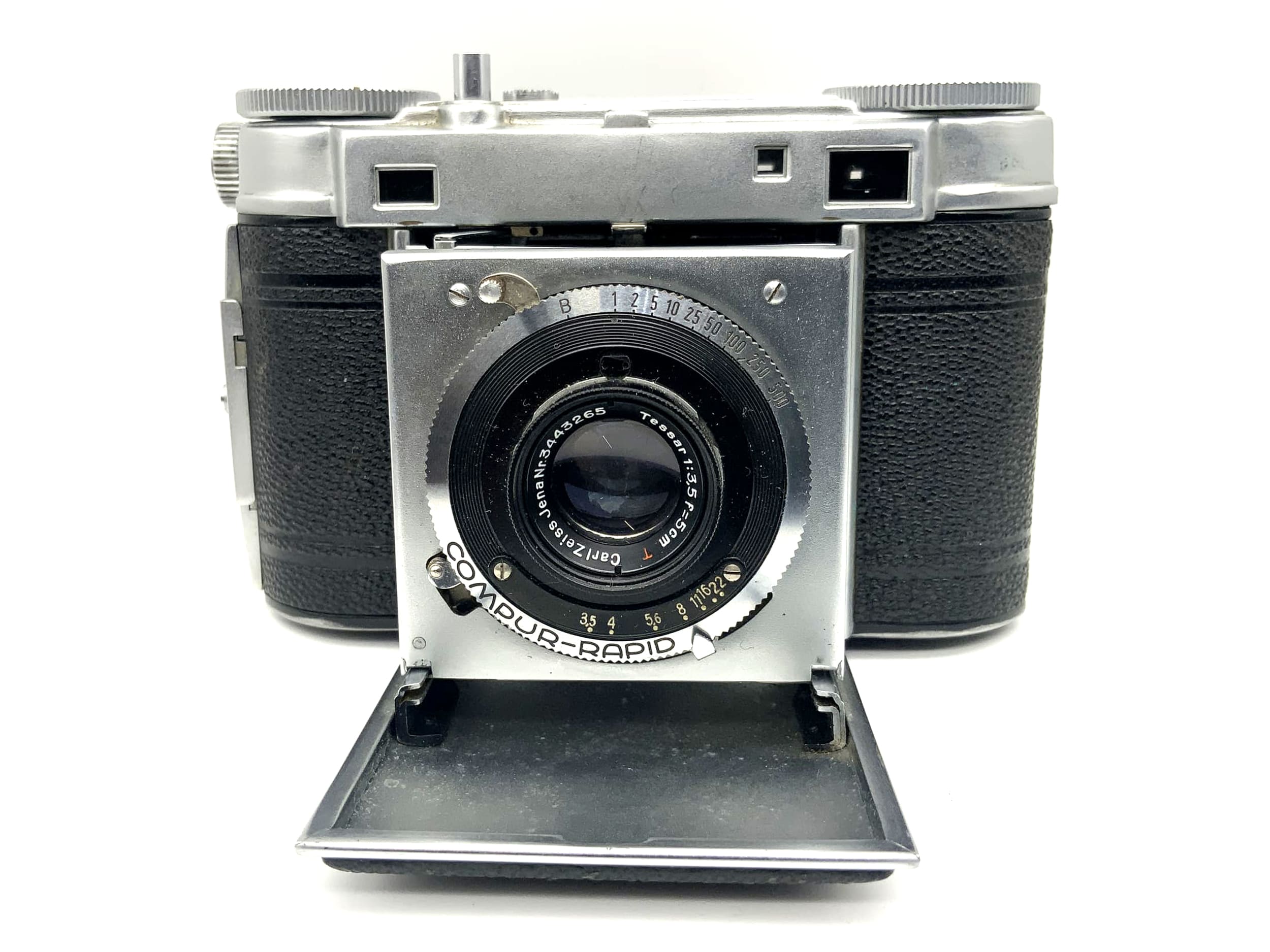 Appareil photo pliant Certo avec objectif Carl Zeiss Tessar 1:3.5 5cm 50mm rouge T Compur Rapid