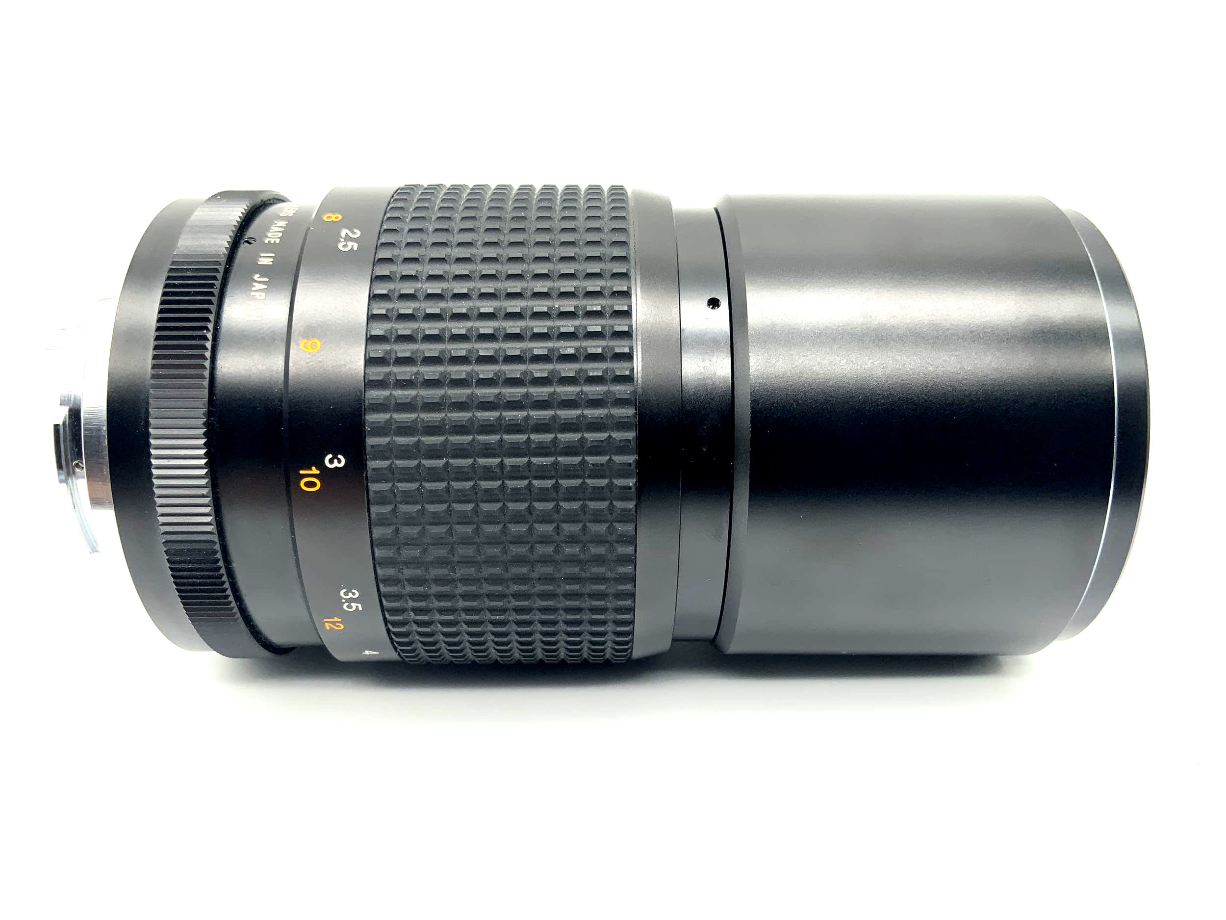 Objectif Tokina 200 mm 1:3.5 RMC pour appareil photo (Minolta MD)