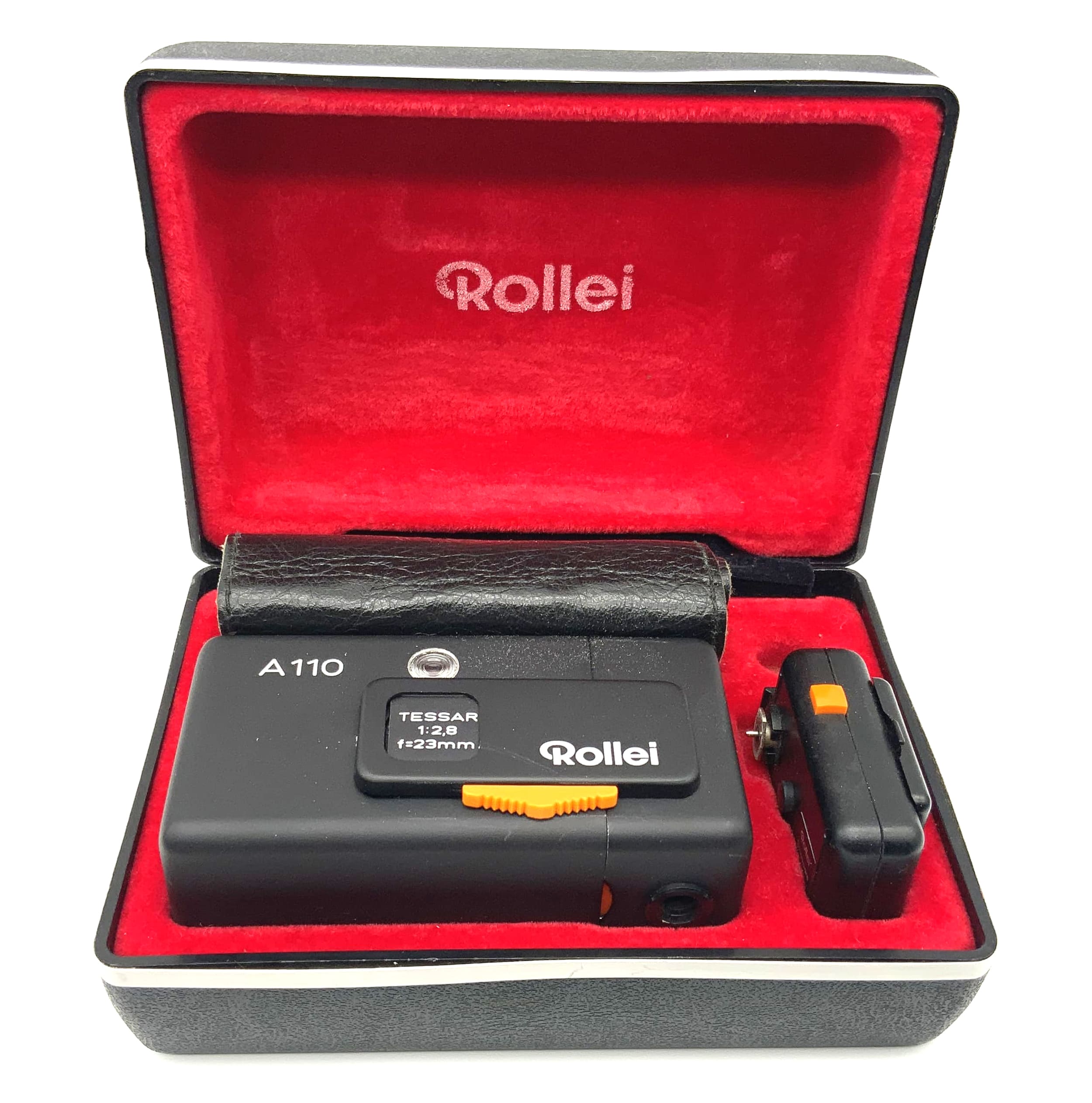 Rollei A110 with Tessar 1:2.8 f=23mm lens, with case, bag and flash spy cam