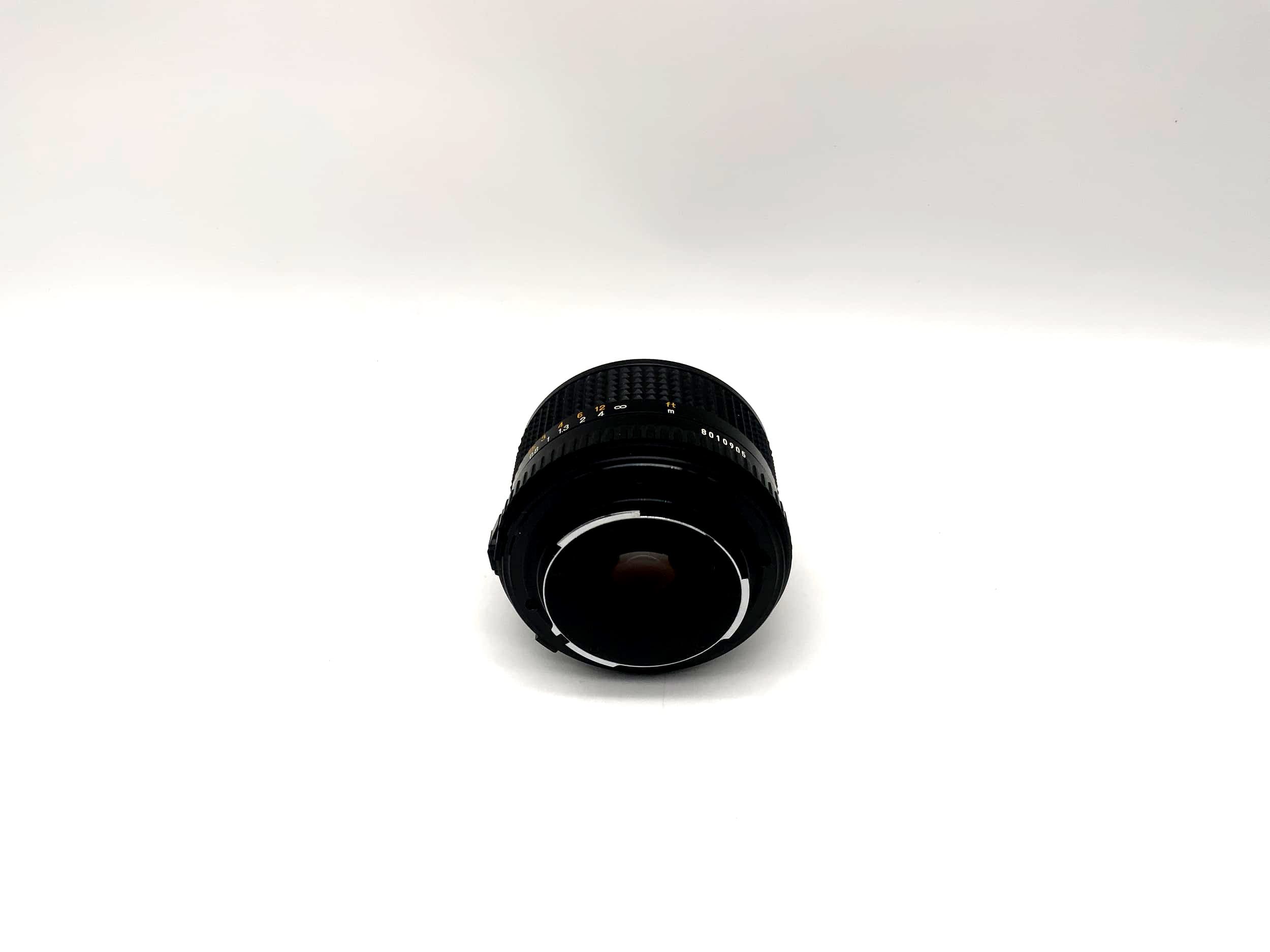 Minolta 28mm 1:2.8 lens with original packaging (Minolta MD)