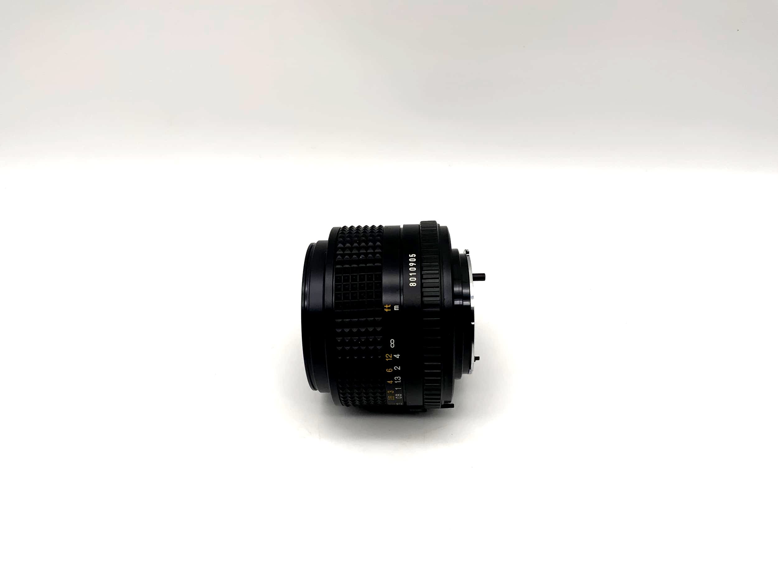 Minolta 28mm 1:2.8 lens with original packaging (Minolta MD)