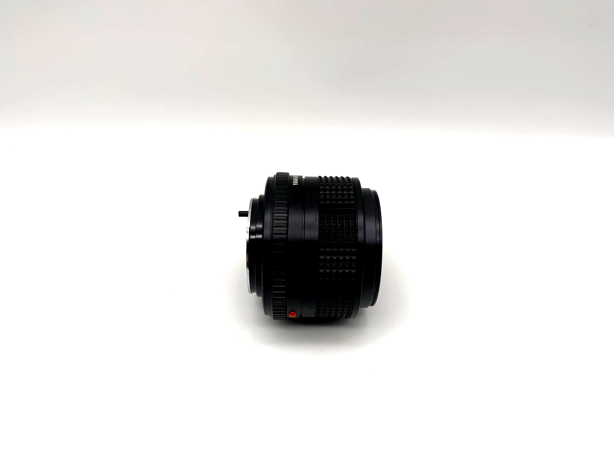 Minolta 28mm 1:2.8 lens with original packaging (Minolta MD)