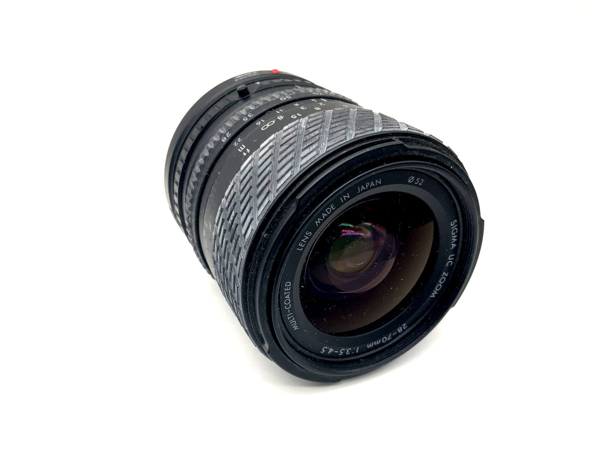 Objectif Sigma 28-70mm 1:3.5-4.5 UC Zoom multicouches (Canon FD)