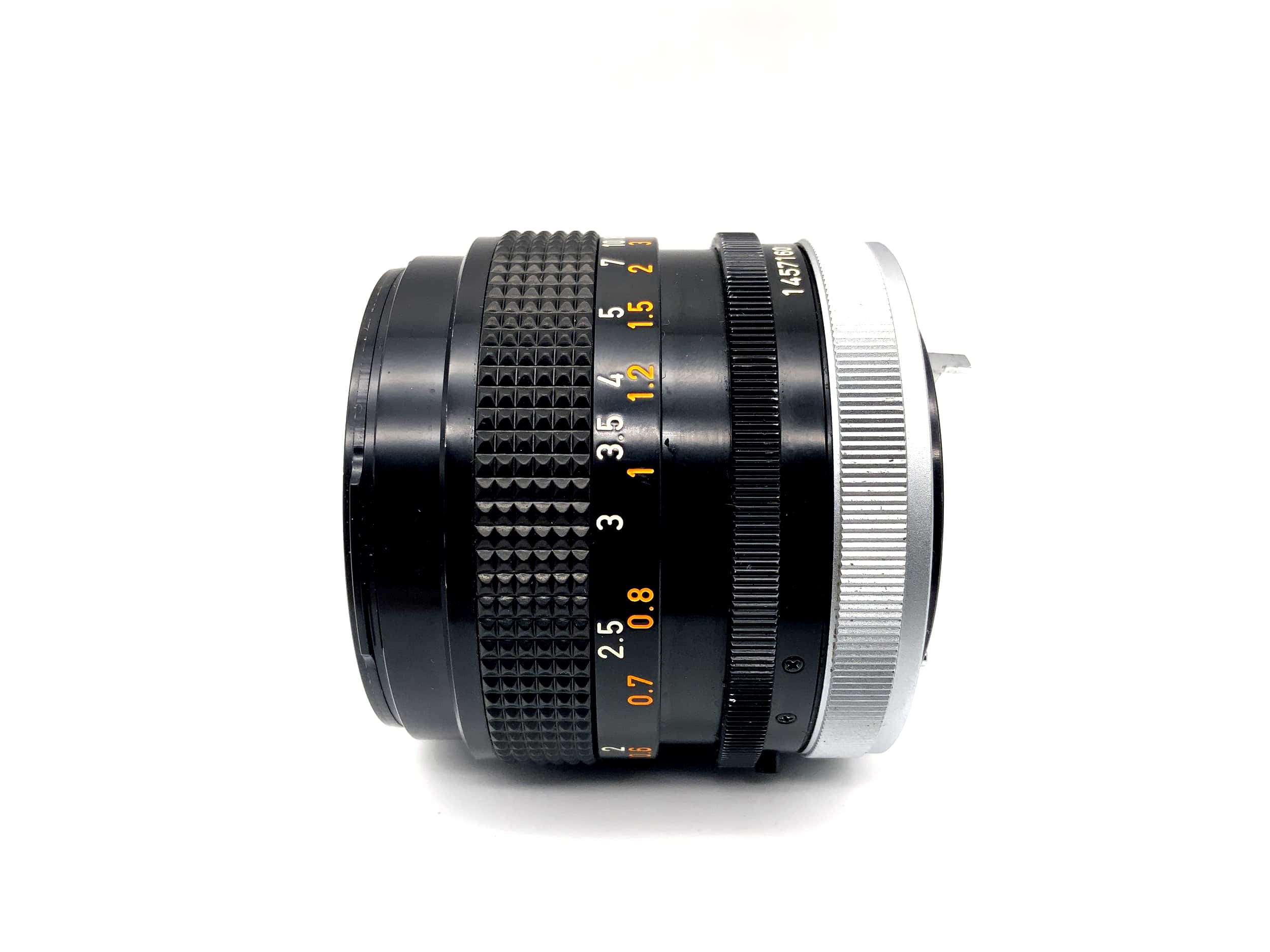 Objectif Canon 50 mm f/1.4 FD SSC (Canon FD) Lire le texte