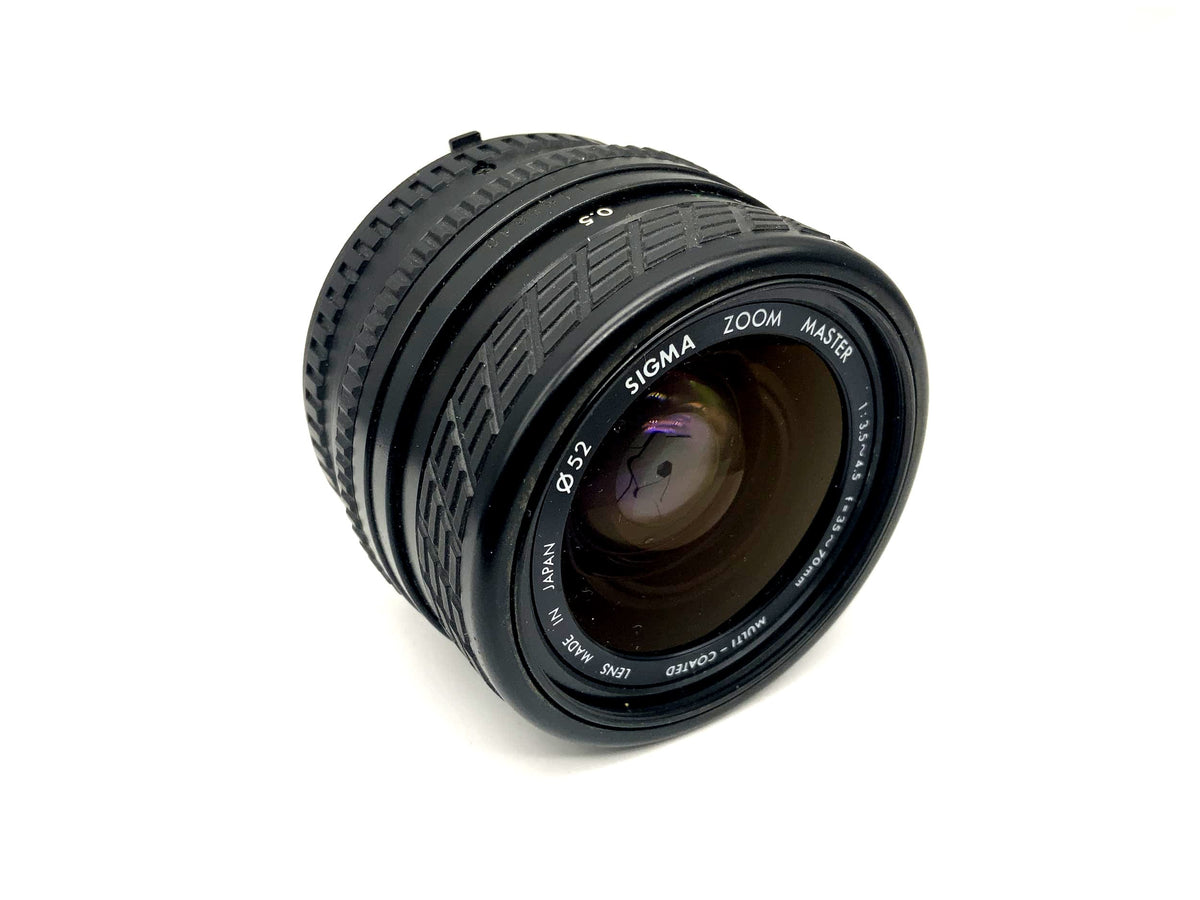 Objectif Sigma 35-70mm 1:3.5-4.5 Zoom Master Multi-Coated pour appareil photo (Nikon F)
