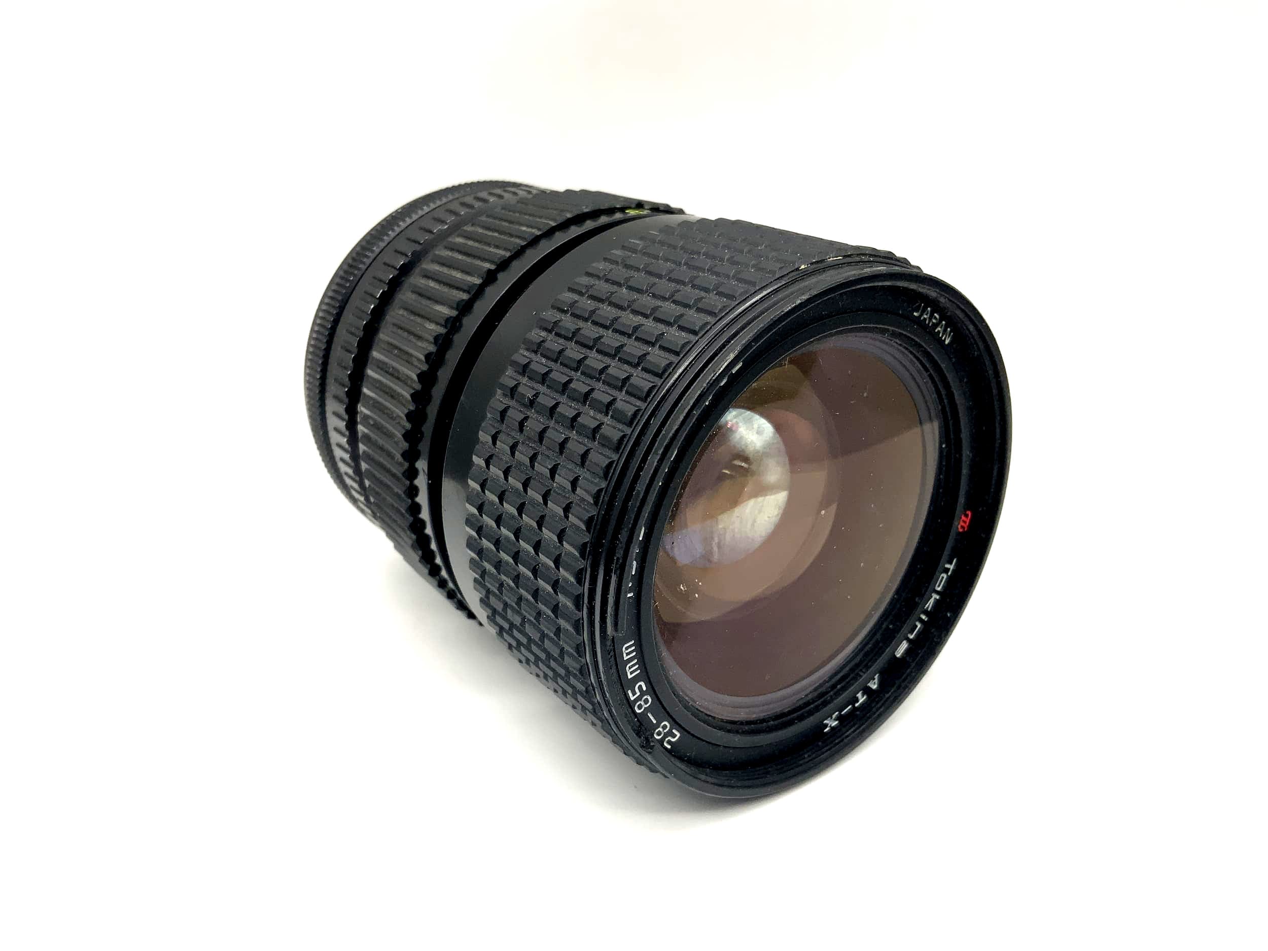 Objectif Tokina 28-85mm 1:3.5-4.5 AT-X pour appareil photo (Canon FD)
