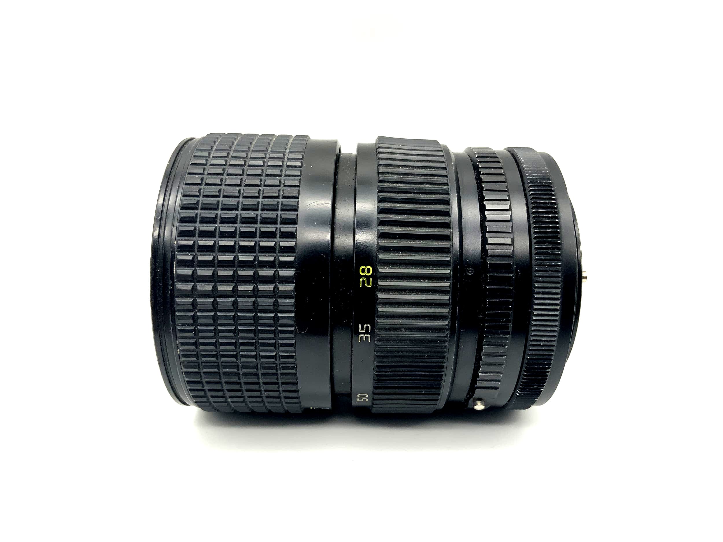 Objectif Tokina 28-85mm 1:3.5-4.5 AT-X pour appareil photo (Canon FD)