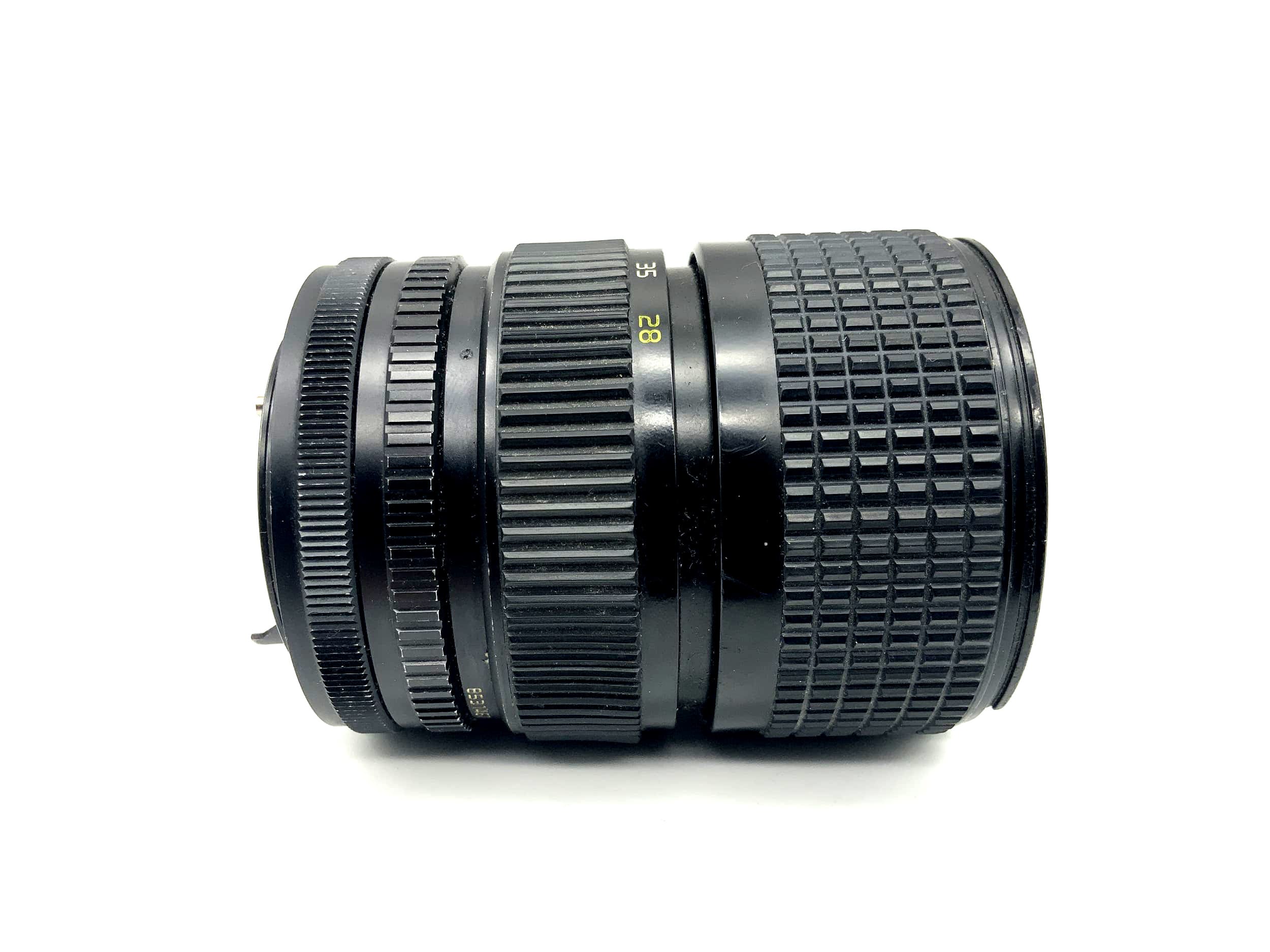 Objectif Tokina 28-85mm 1:3.5-4.5 AT-X pour appareil photo (Canon FD)