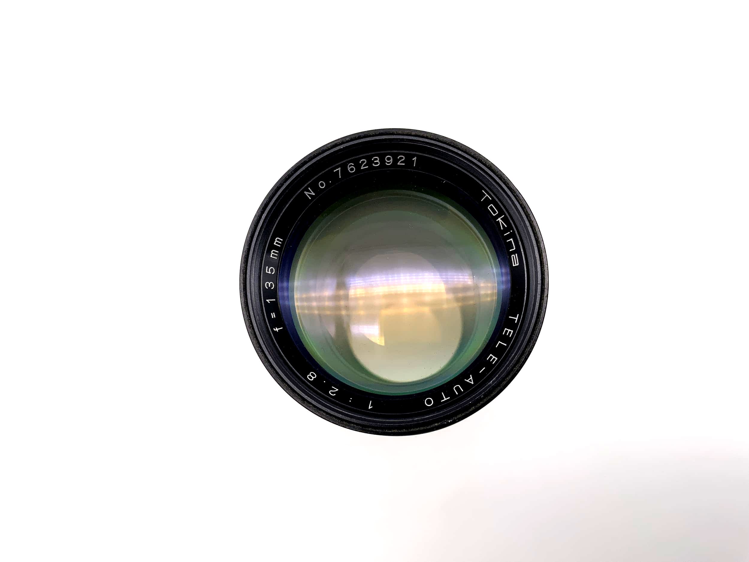 Objectif téléobjectif Tokina 135 mm 1:2.8 pour appareil photo automatique (Olympus OM)