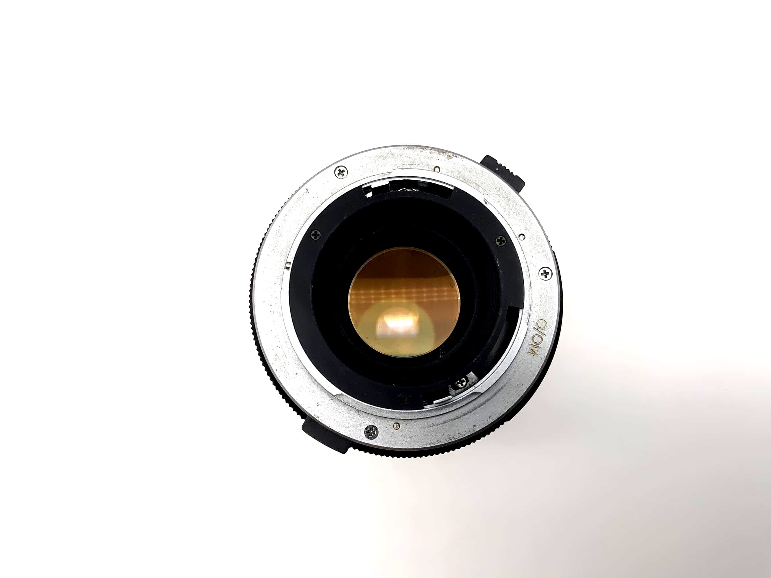Objectif téléobjectif Tokina 135 mm 1:2.8 pour appareil photo automatique (Olympus OM)