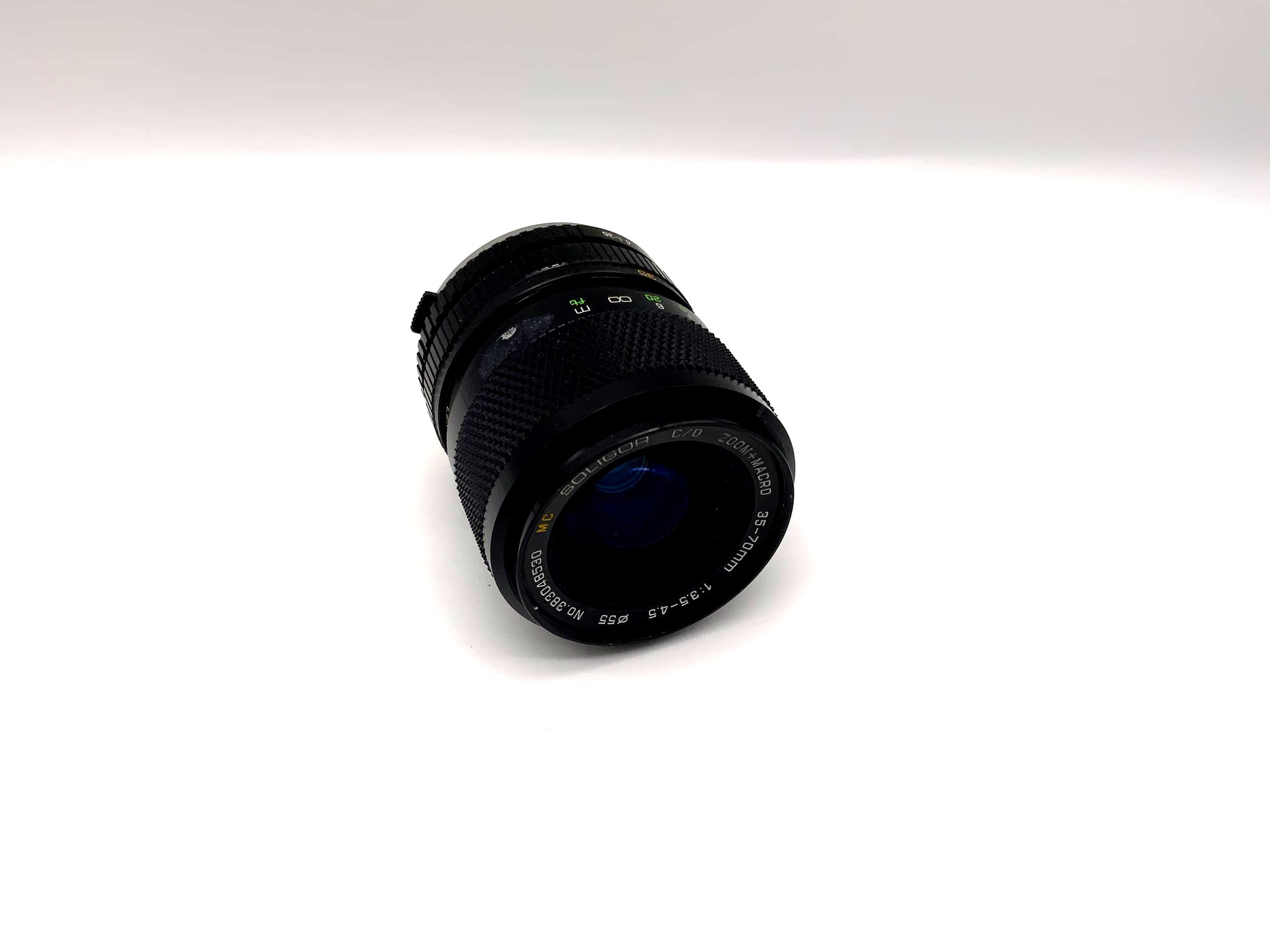 Soligor 35-70mm 1:3.5-4.5 Lens C/D Zoom + Macro MC Camera Lens (Olympus OM)