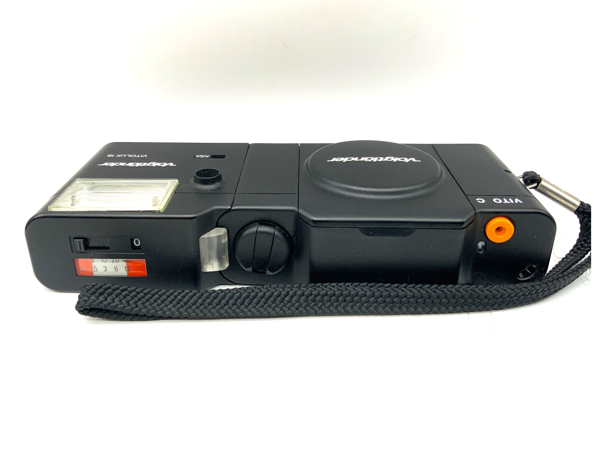 Voigtländer Vito C rangefinder camera with Color Skopar 2.8/38 lens and Vitolux 18 flash.