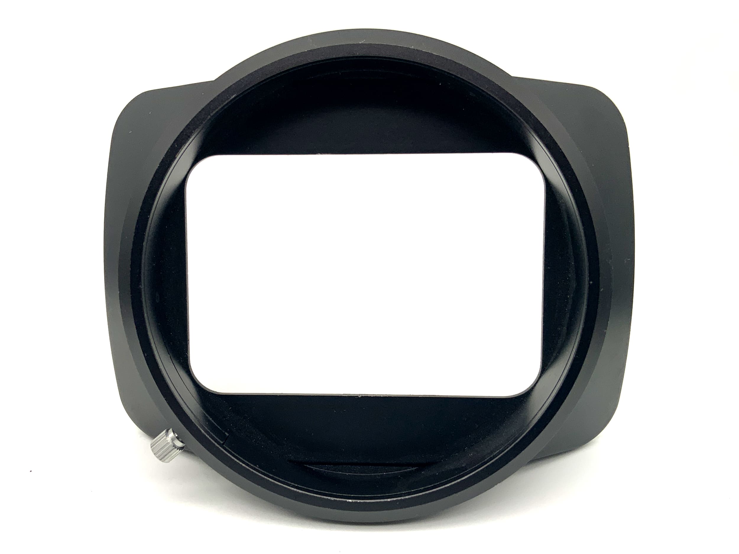 Yashica 75mm lens hood for 20mm f/3.3 lens in original packaging and case.