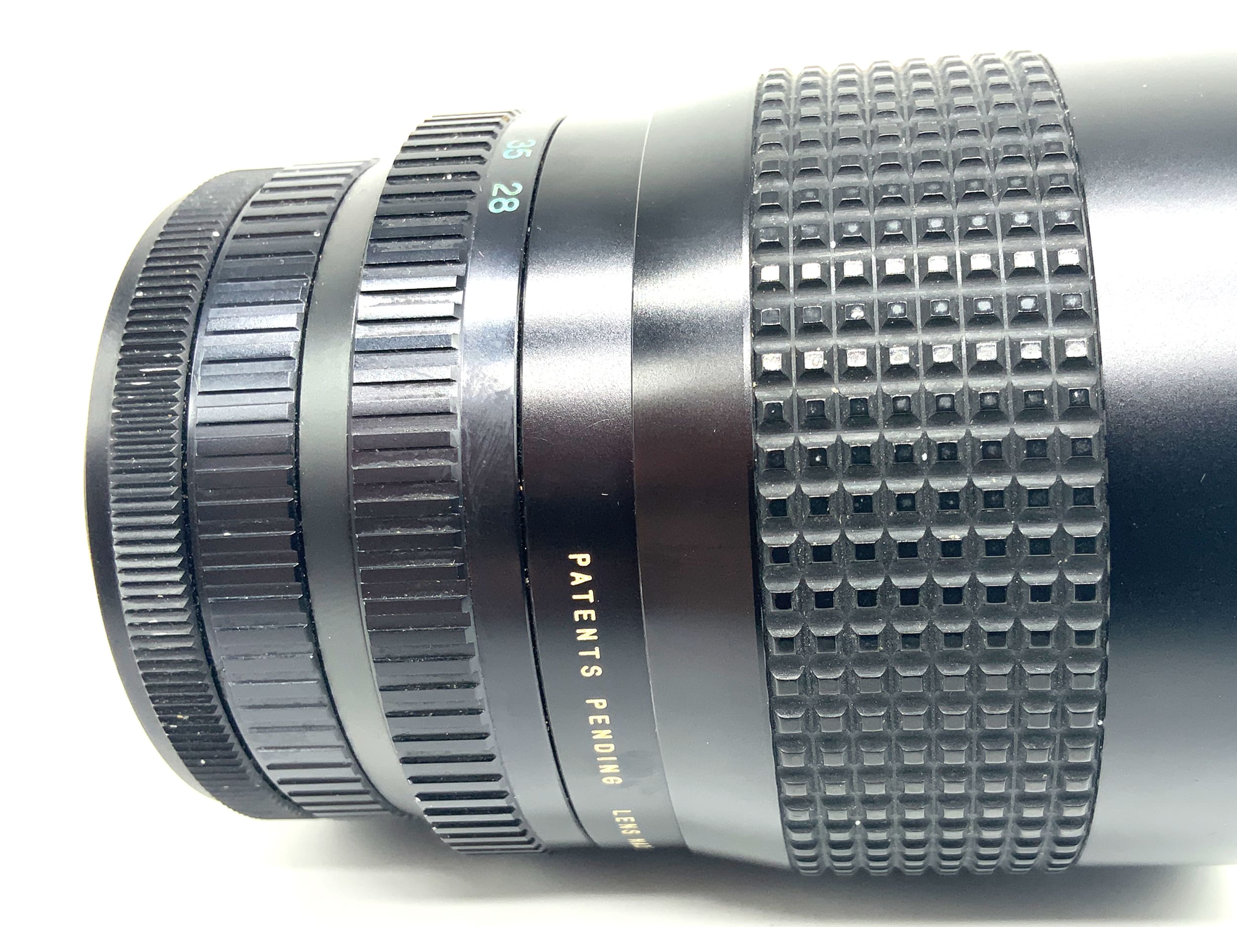 Tokina RMC II 28-85mm 1:4 Objektiv Zoomobjektiv (Canon FD)