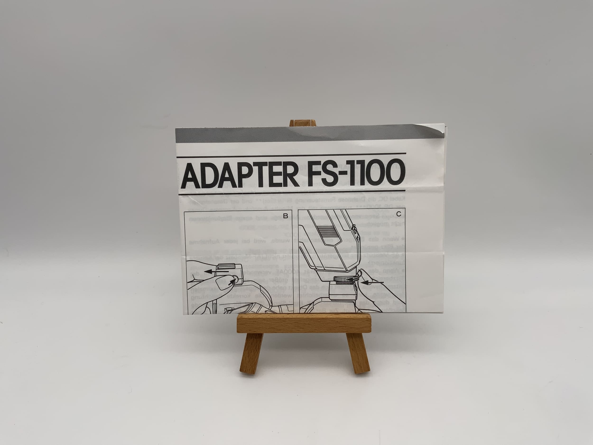 Manuel d'utilisation de l'adaptateur de griffe flash Minolta FS-1100 (allemand)