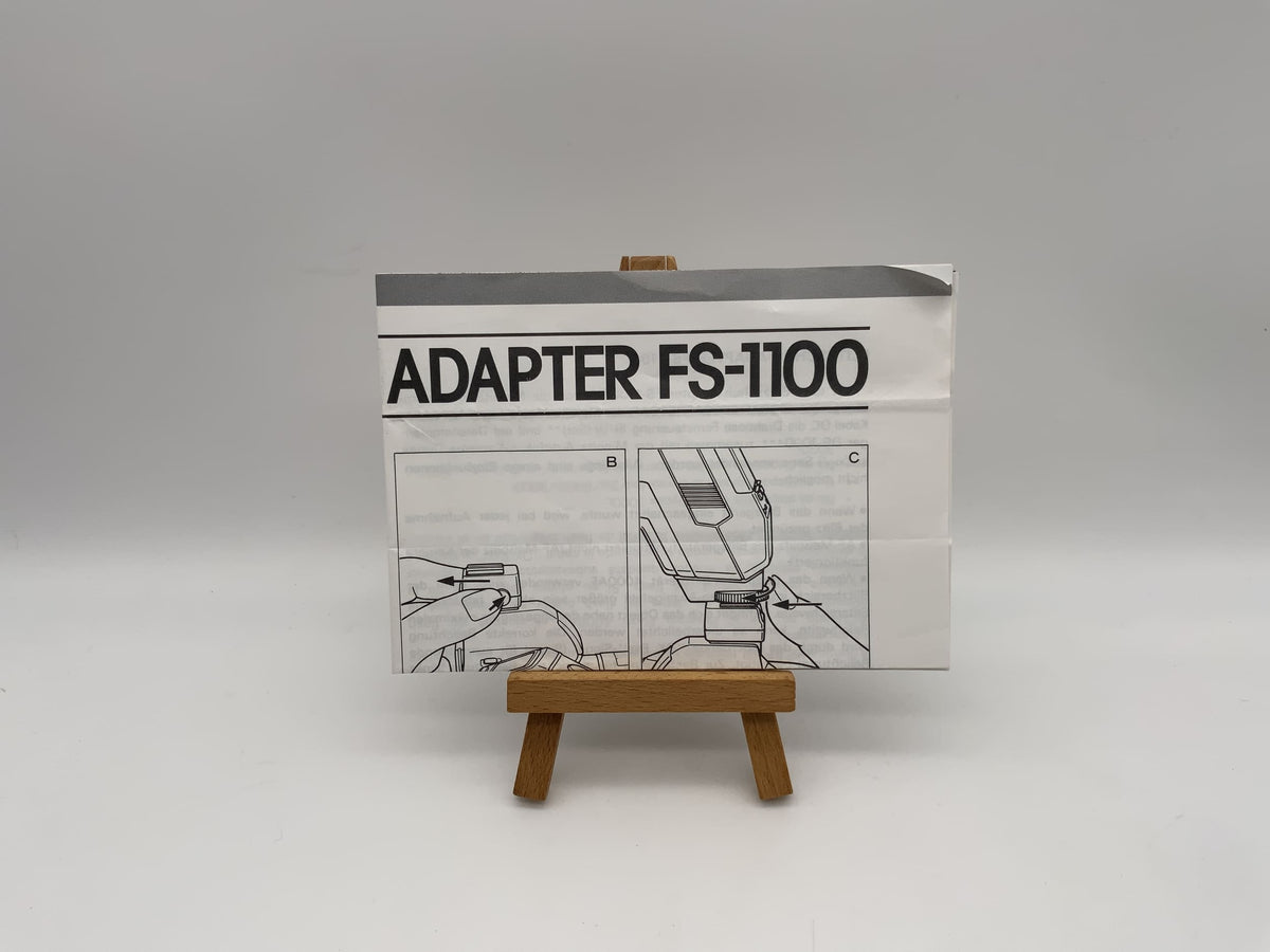 Manuel d'utilisation de l'adaptateur de griffe flash Minolta FS-1100 (allemand)