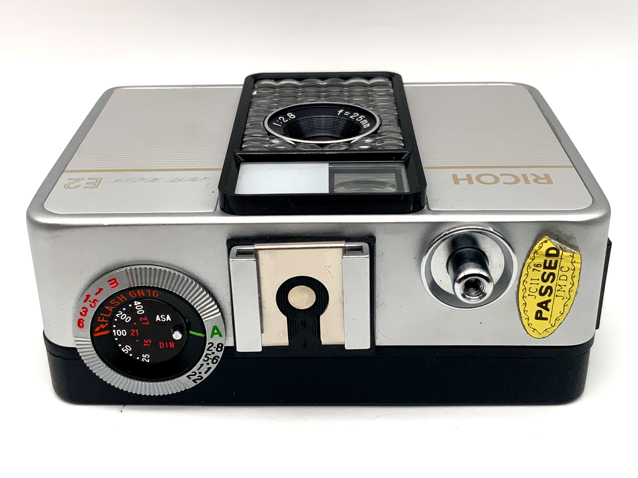 Ricoh Auto Half E2 viewfinder camera with f/2.8 f=25mm half-frame lens in original packaging, analog camera