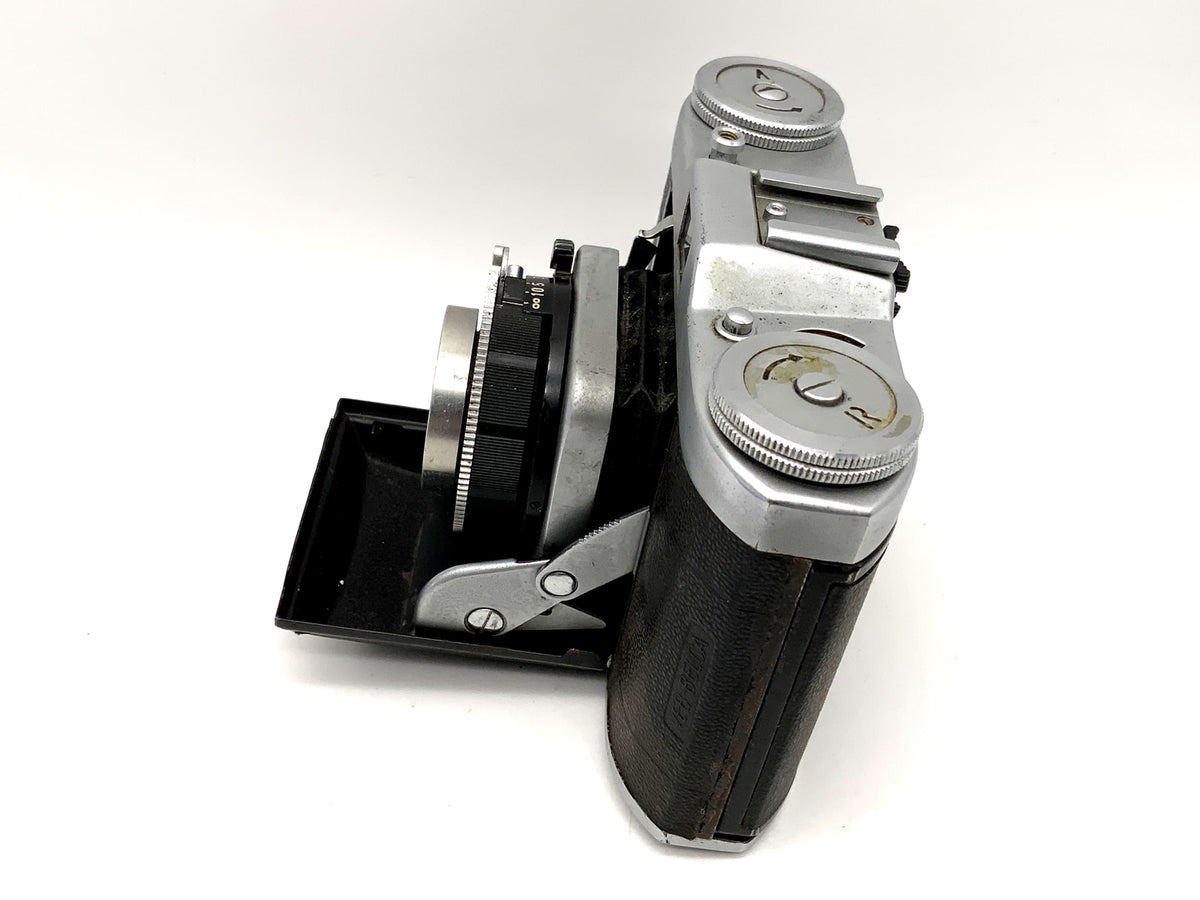 Appareil photo pliant Balda Beltica avec objectif Carl Zeiss Tessar 1:2.8 50 mm rouge T