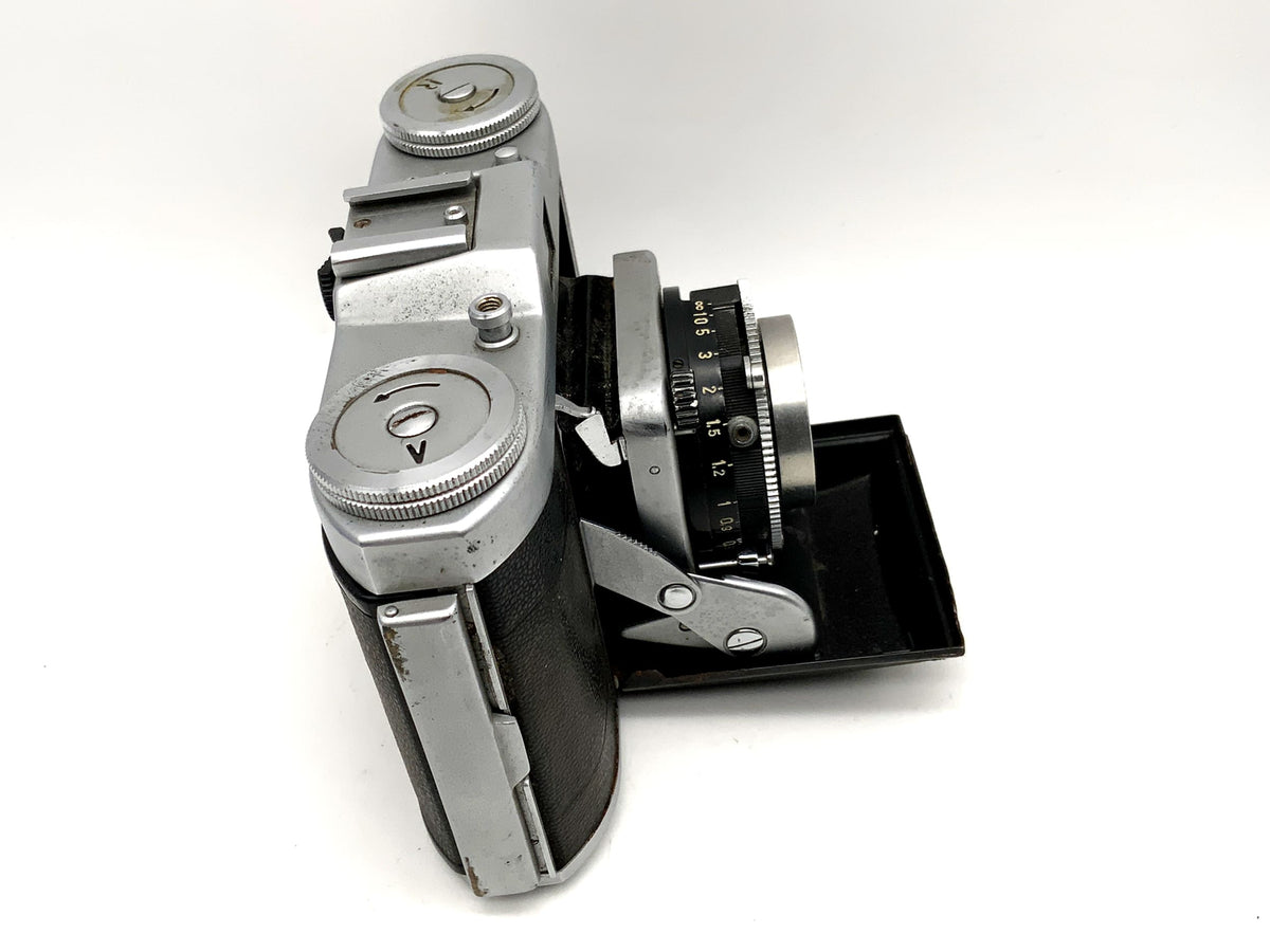 Appareil photo pliant Balda Beltica avec objectif Carl Zeiss Tessar 1:2.8 50 mm rouge T