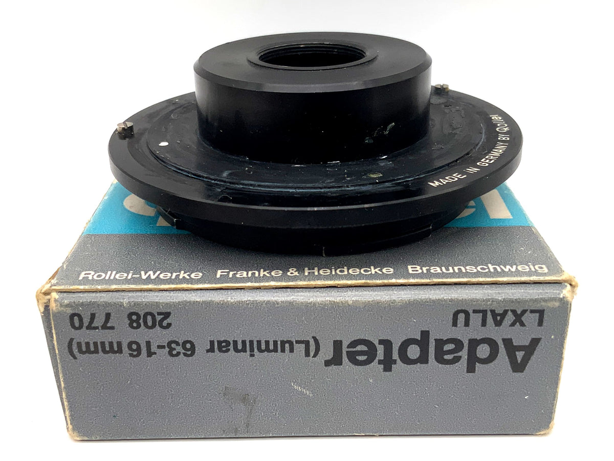 Adaptateur d'objectif Rollei LXALU 208 770 dans son emballage d'origine (Luminar 63-16mm -> SL 66)