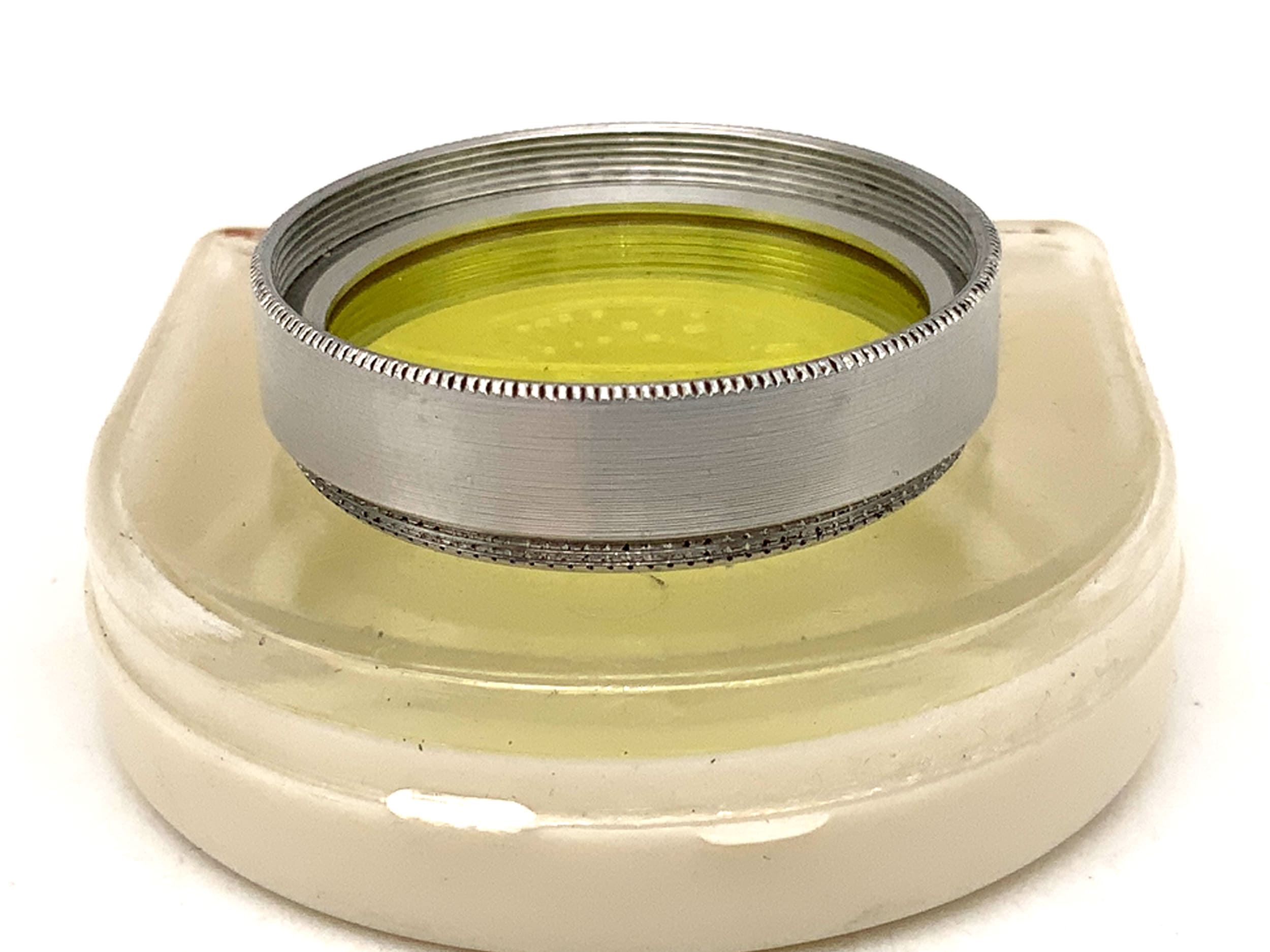 Filtre de couleur Arnz Jena jaune clair dans son étui, filetage de 30,5 mm