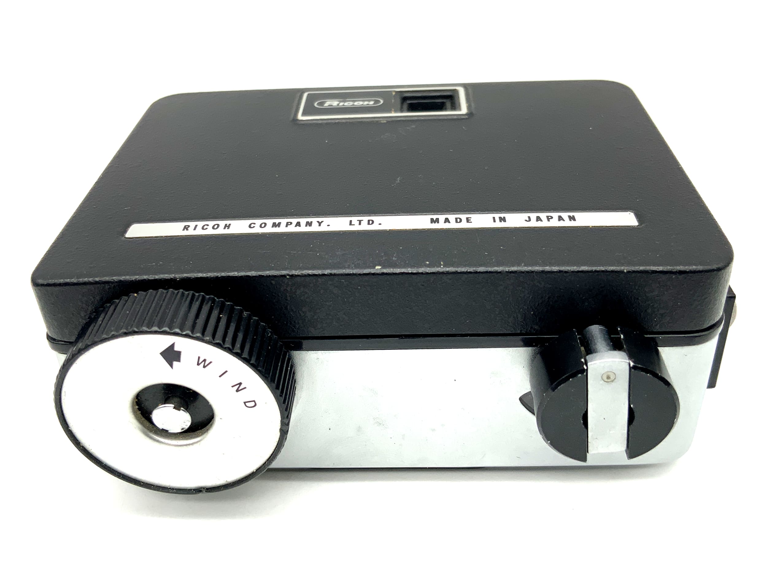 Appareil photo Ricoh Auto Half E avec viseur et objectif Ricoh 25 mm F:2.8 demi-format