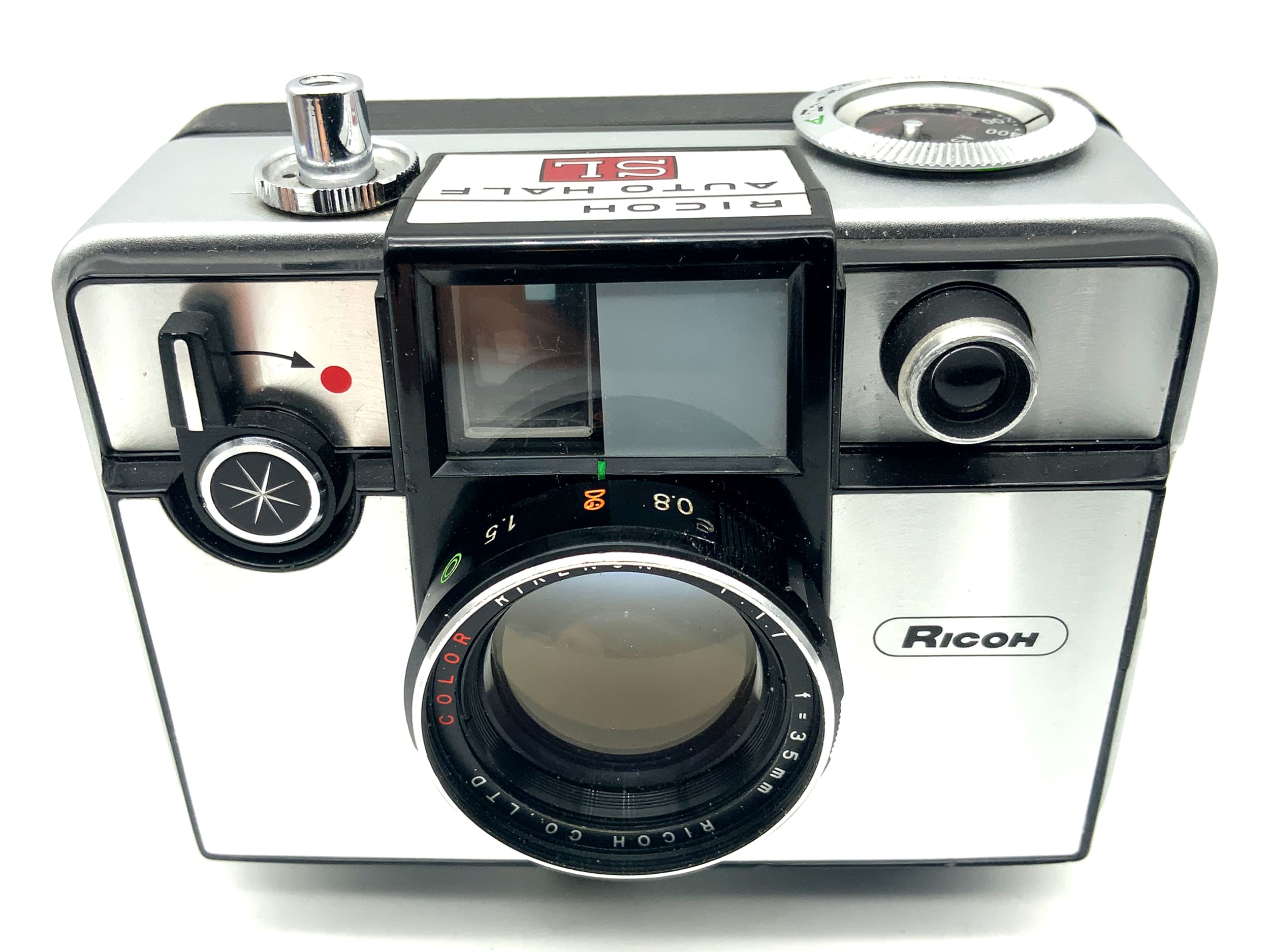 Appareil photo Ricoh Auto Half SL avec viseur et objectif demi-format Color Rikenon 35 mm 1:1,7