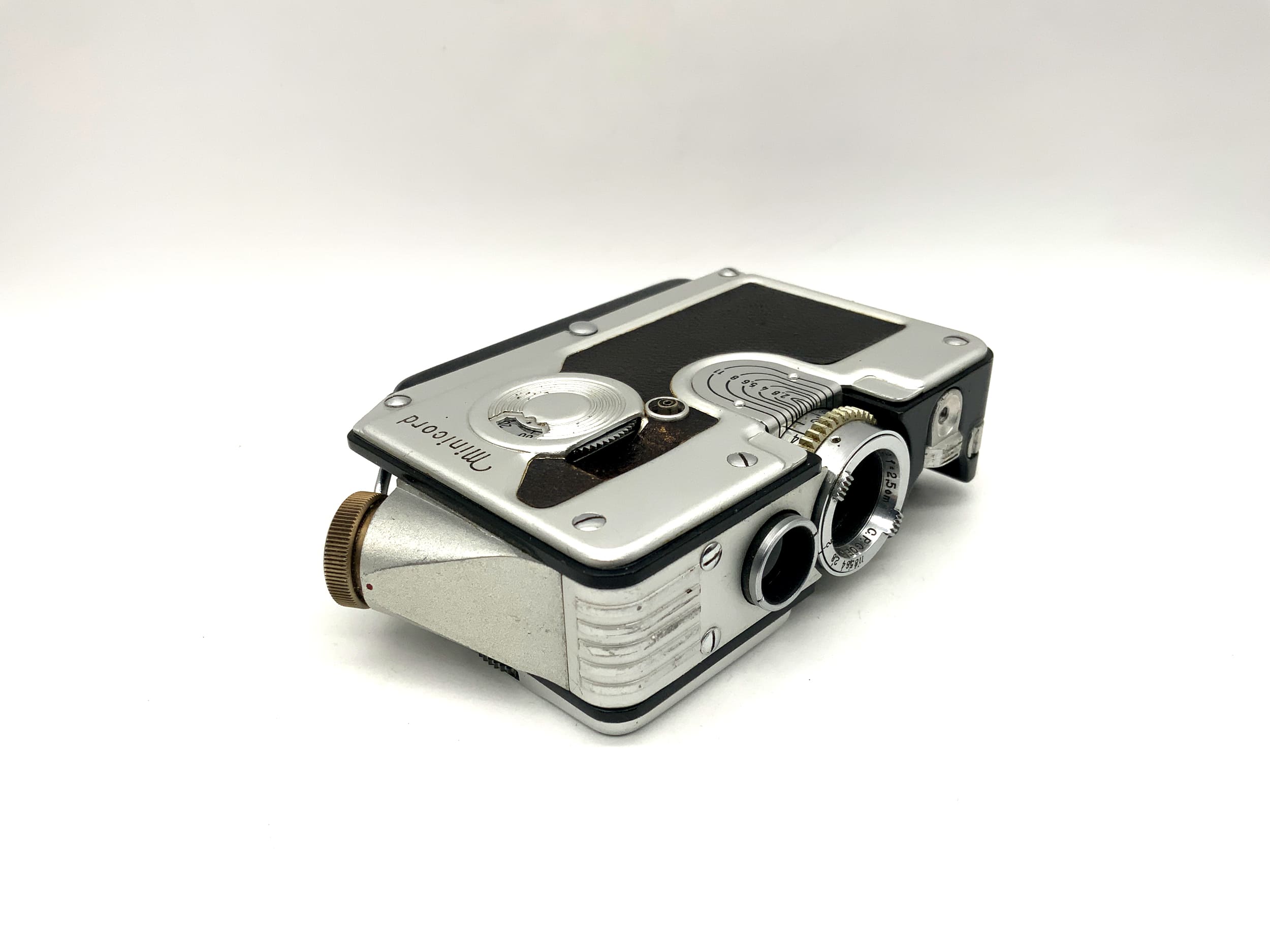 CP Goerz Wien Minicord 3 TLR avec objectif Helgor 25 mm f/2 et étui, reflex bi-objectif