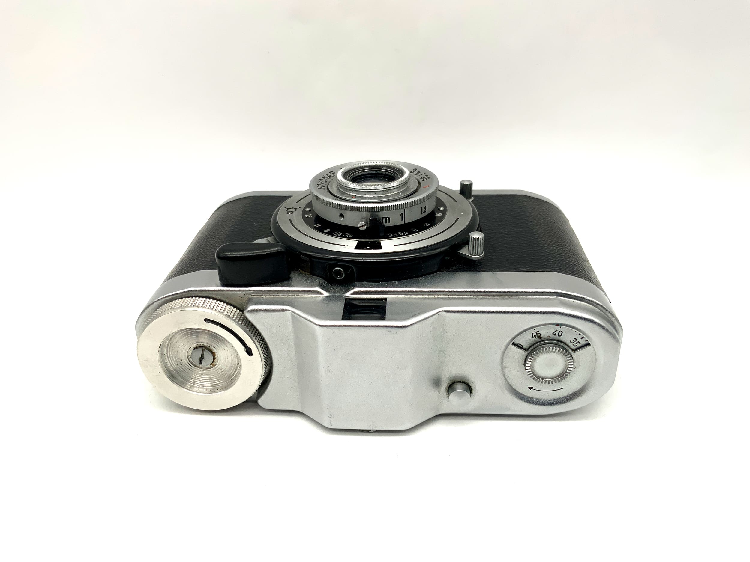 Pentacon Taxona viewfinder camera with Novar Anastigmat 35mm 1:3.5 red V Vebur