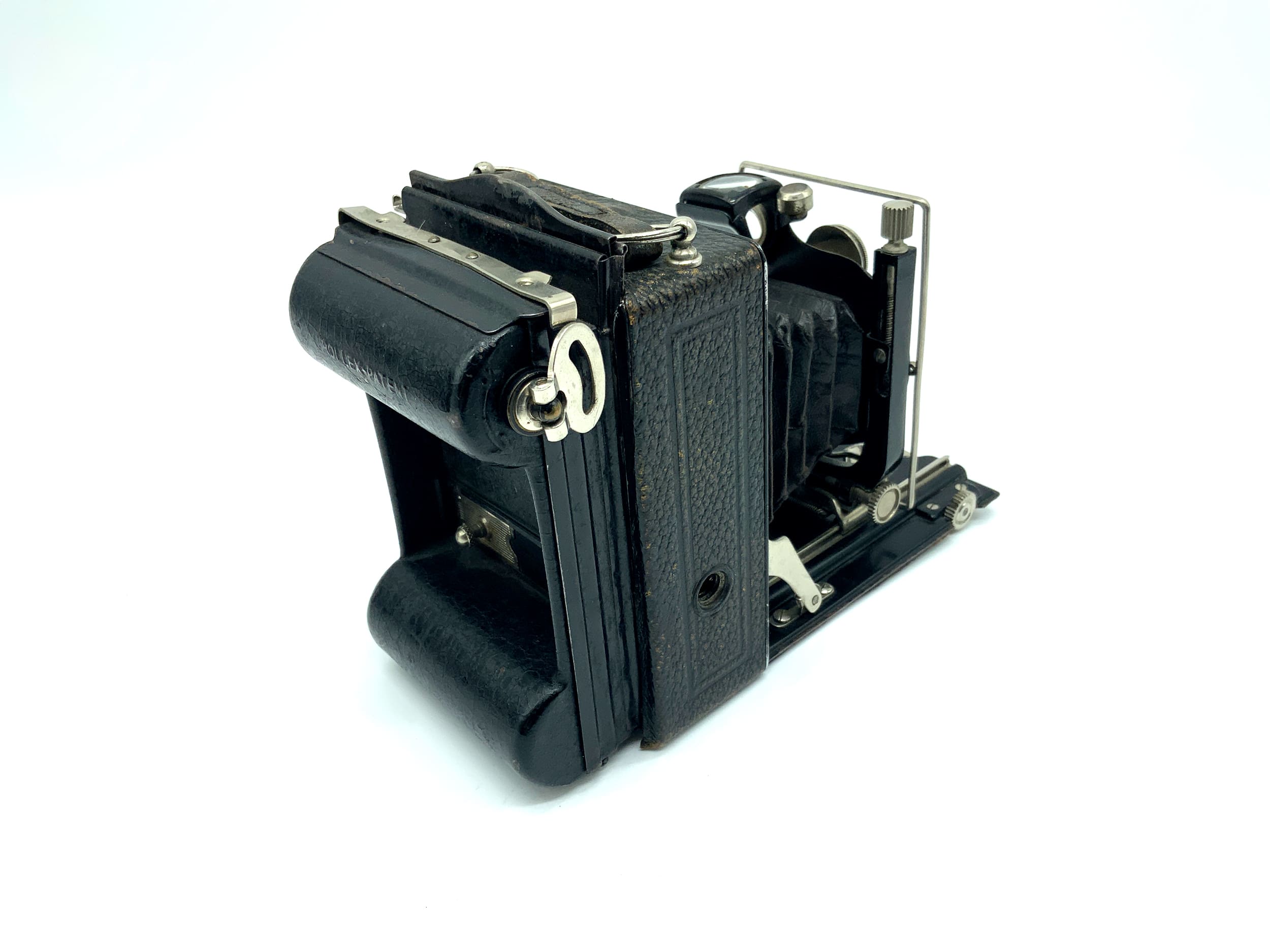 Wauckosin Wara plate camera with Plaubel Pecomat 10.5cm 1:4.5 lens with Rollex patent