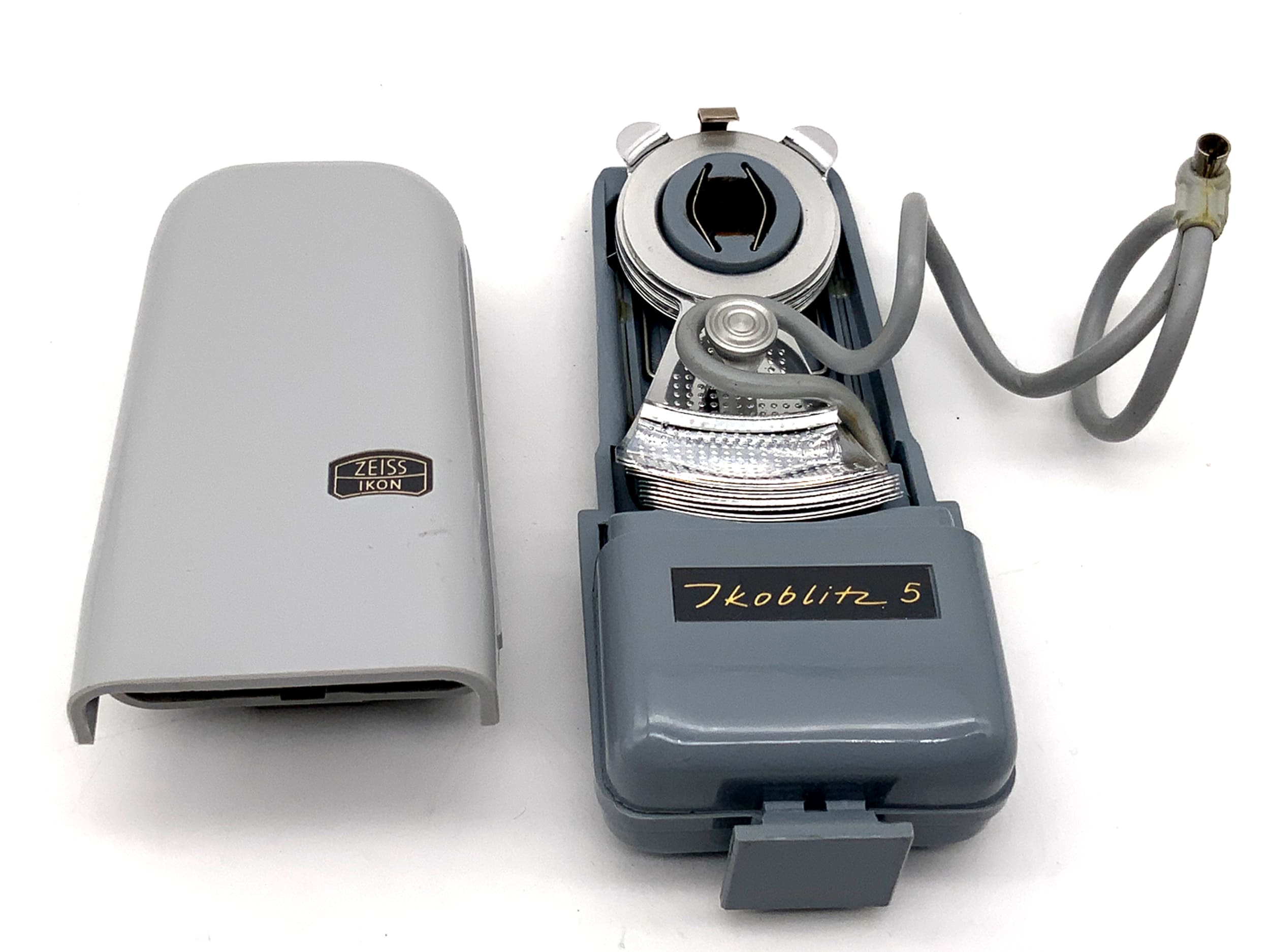 Flash Zeiss Ikon Ikoblitz 5, contact central, dans son emballage d'origine, flash universel