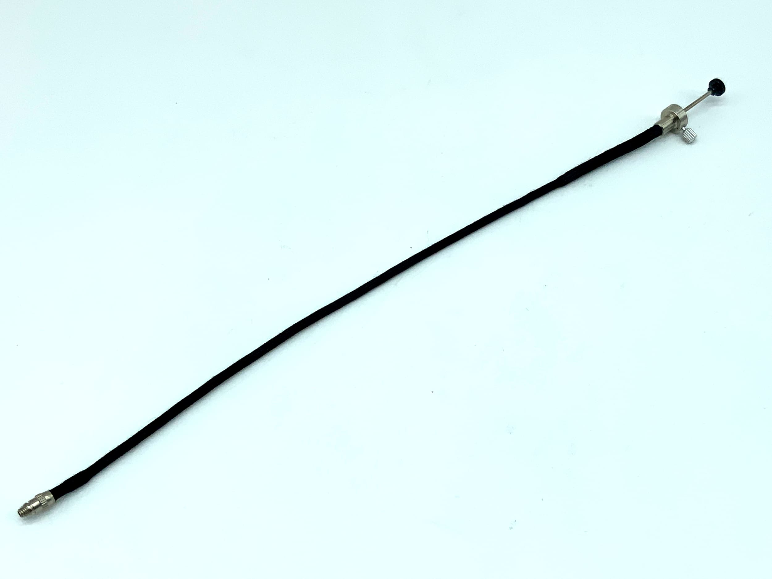 Déclencheur à distance noir, environ 25 cm, avec mécanisme de verrouillage.
