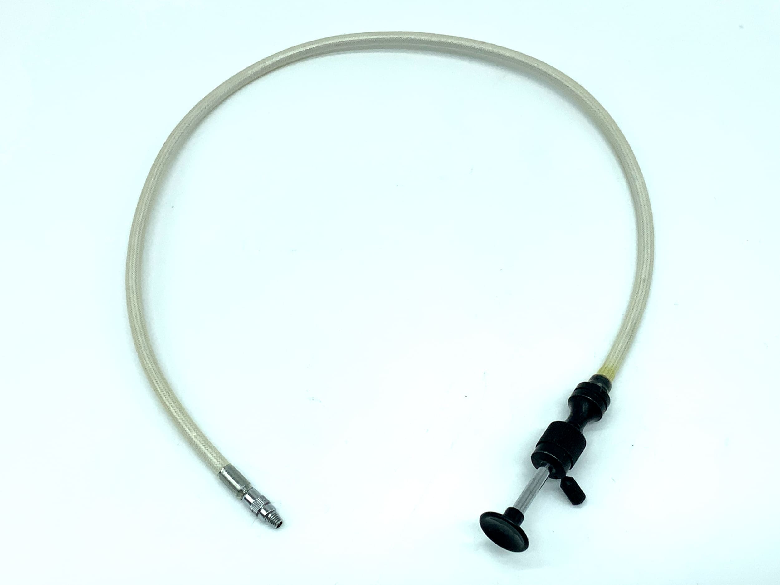White cable release, approx. 40cm, with locking mechanism. Remote release cable release.