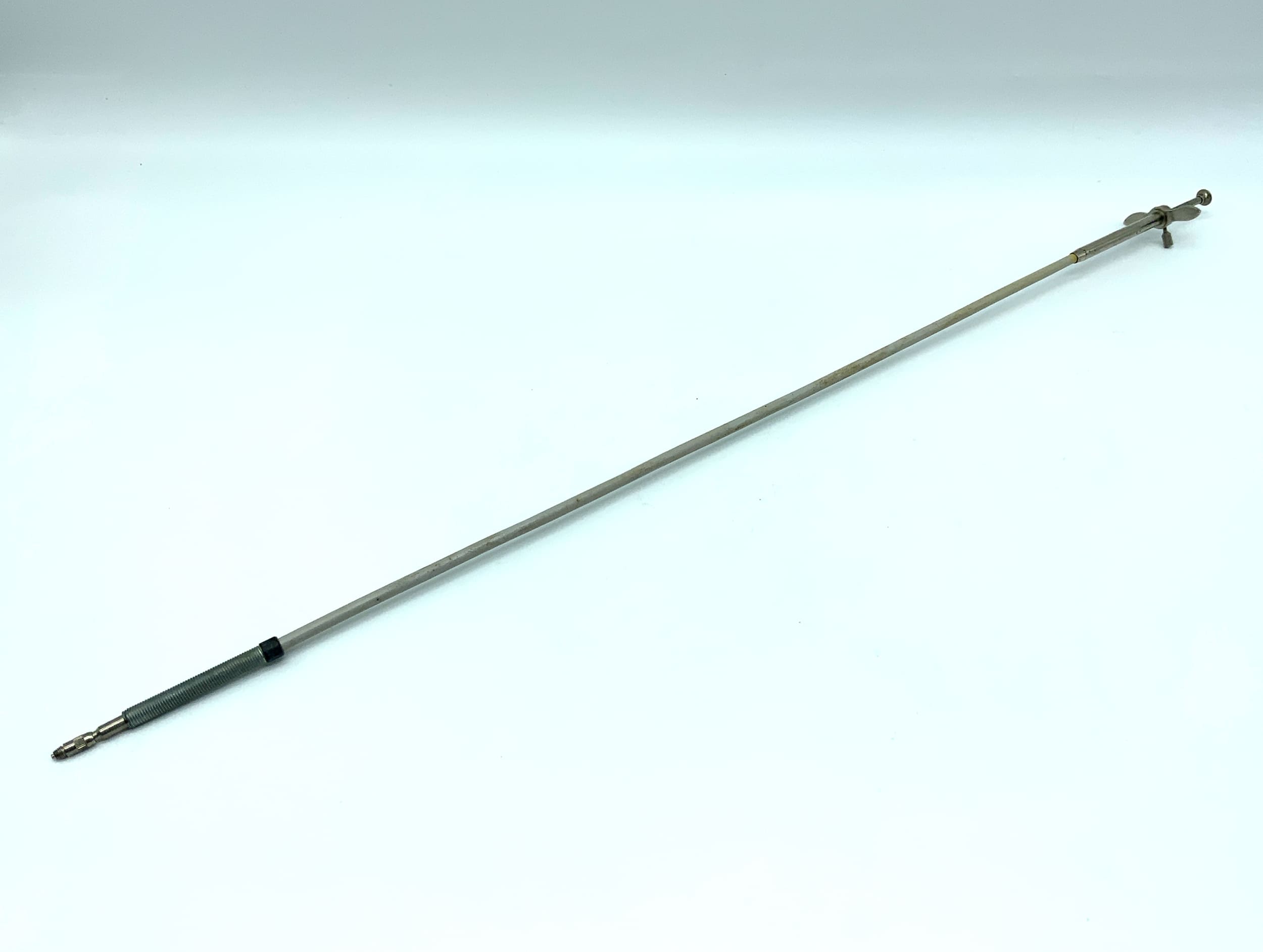White/silver cable release, approx. 50cm, with locking mechanism. Remote release cable release.