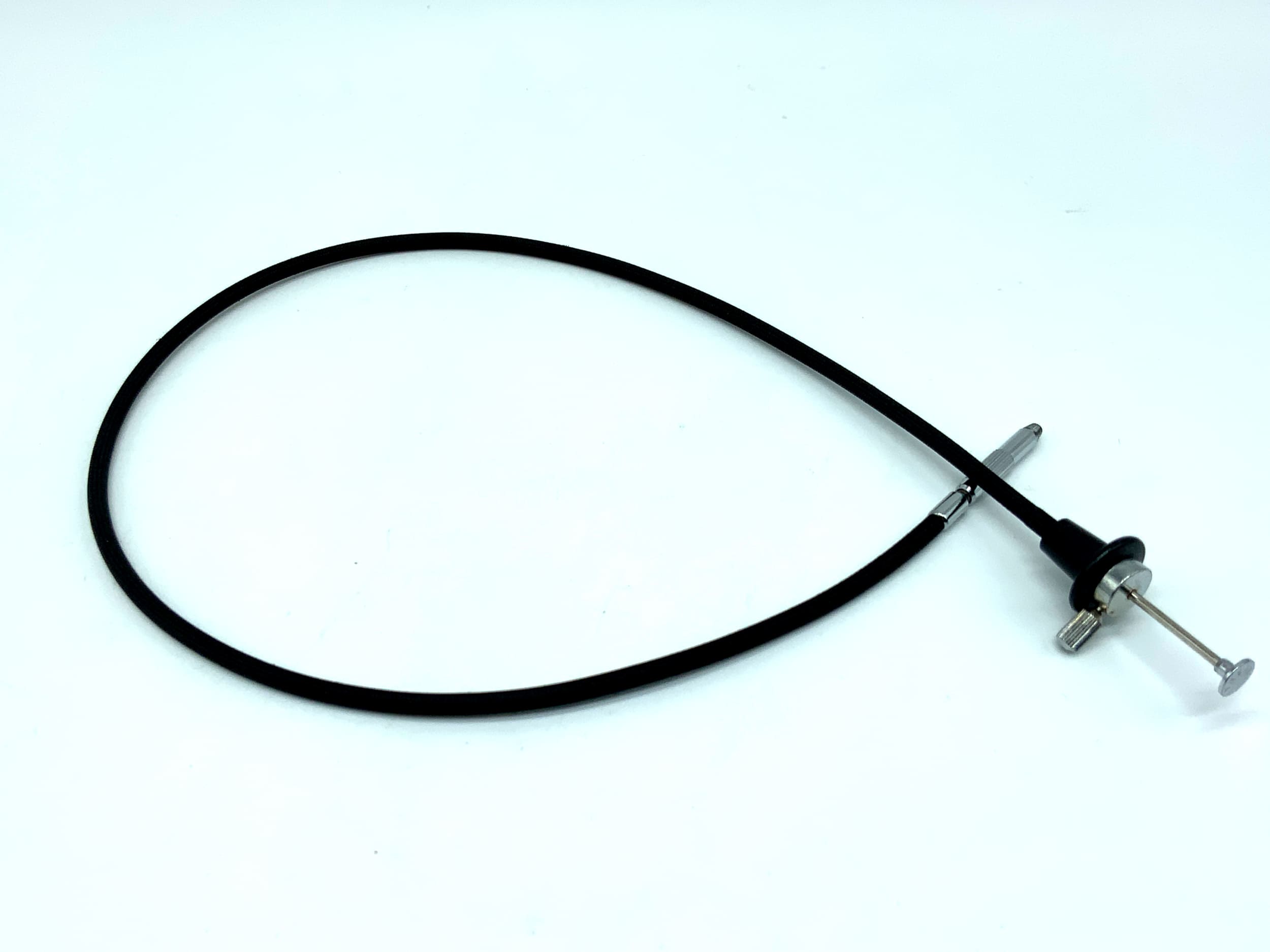 Déclencheur à distance noir, environ 50 cm, avec mécanisme de verrouillage.